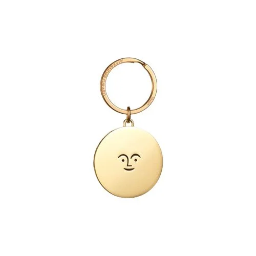 Alexander Girard Sun Key Ring by Vitra in polished brass with iconic sun motif.