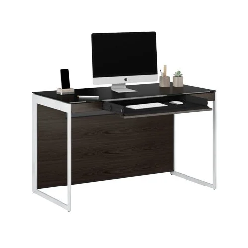 Fingerprint-resistant desk surface with minimalist steel frame and warm ash finish.