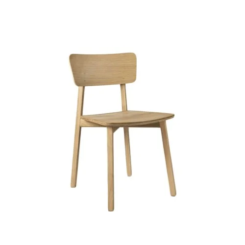 Designer Carlos Baladia’s Casale Chair shown in a modern dining setup