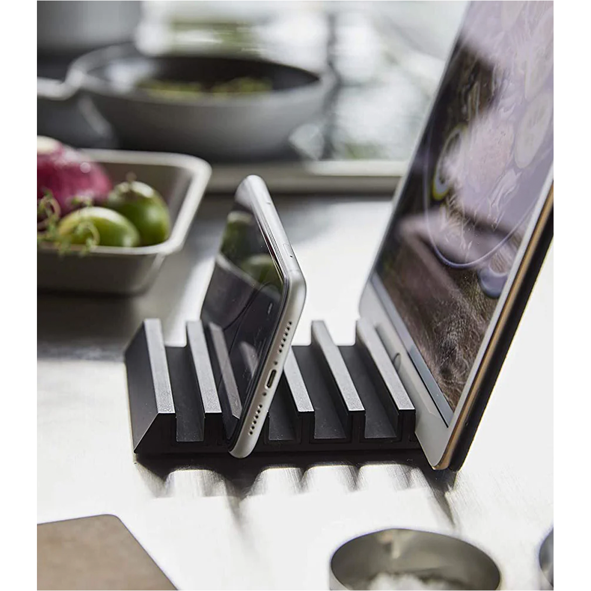 Sleek modern device stand for phones or tablets, perfect for charging and stability.