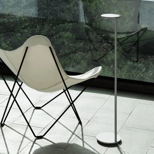 Oblique LED floor lamp with angled optical lens and precise illumination.