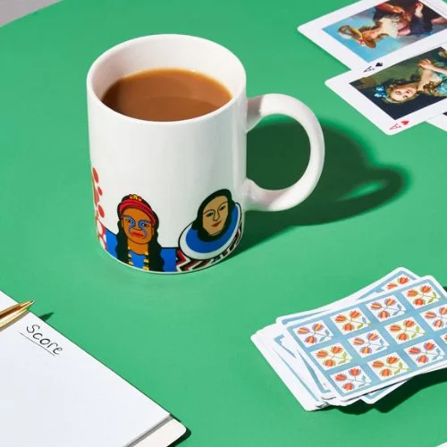 Detail view of bold, colorful illustrations on the Great Modern Artists Female Edition mug.