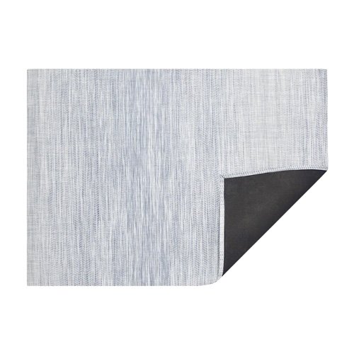 Chilewich Wave Rug with fluid woven pattern, durable vinyl design, and modern style for indoor and outdoor spaces.
