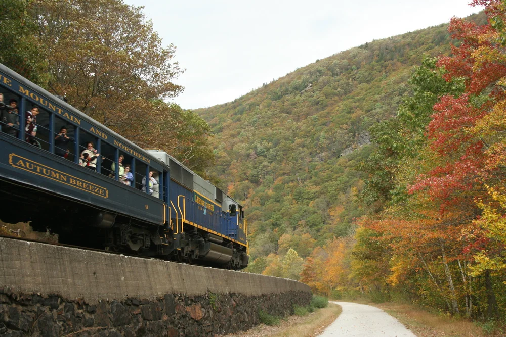Lehigh Gorge Scenic Railway train surrounded by autumn foliage