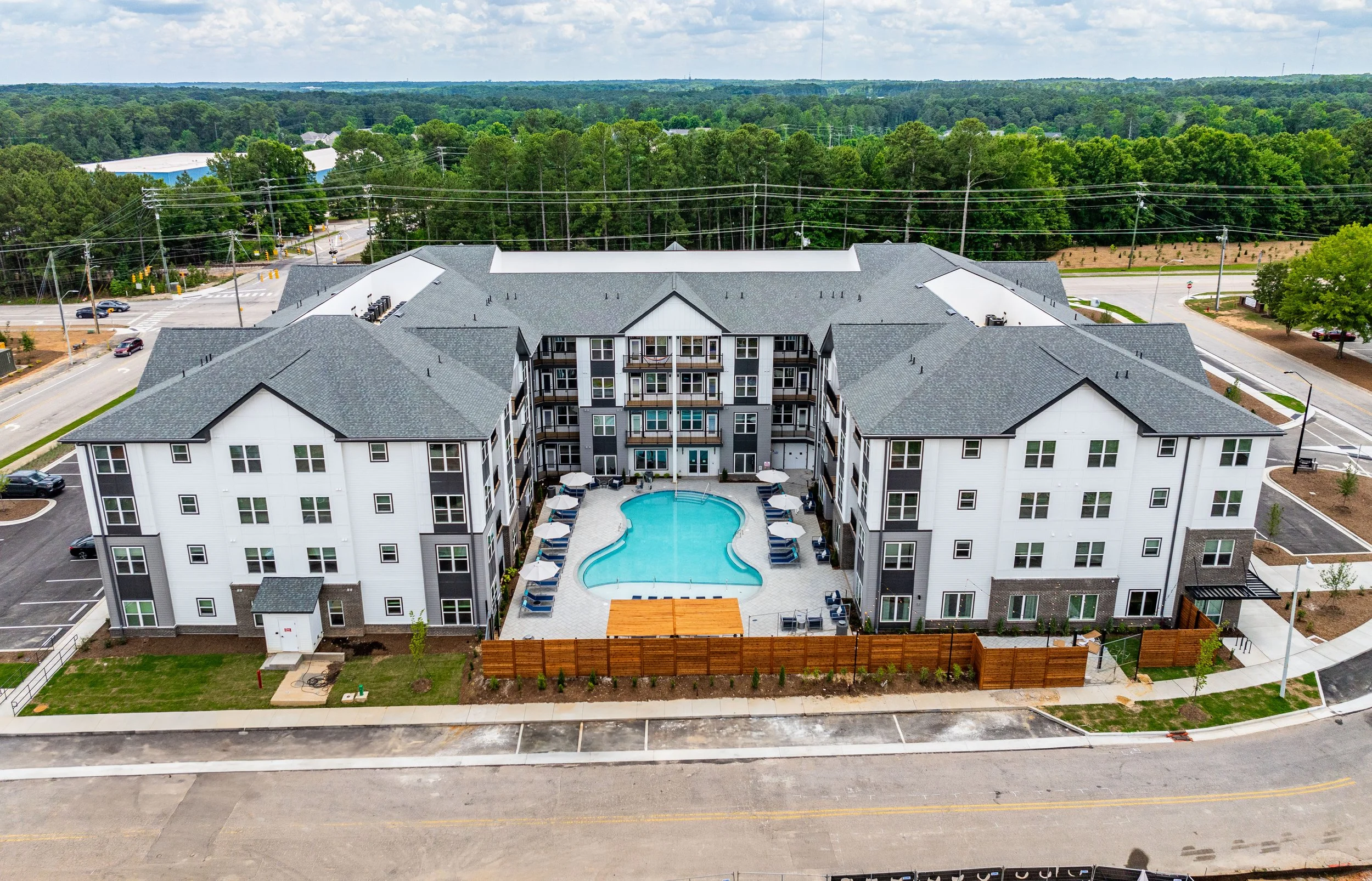 Photo 3 - Building 1 Drone Pool View.jpg