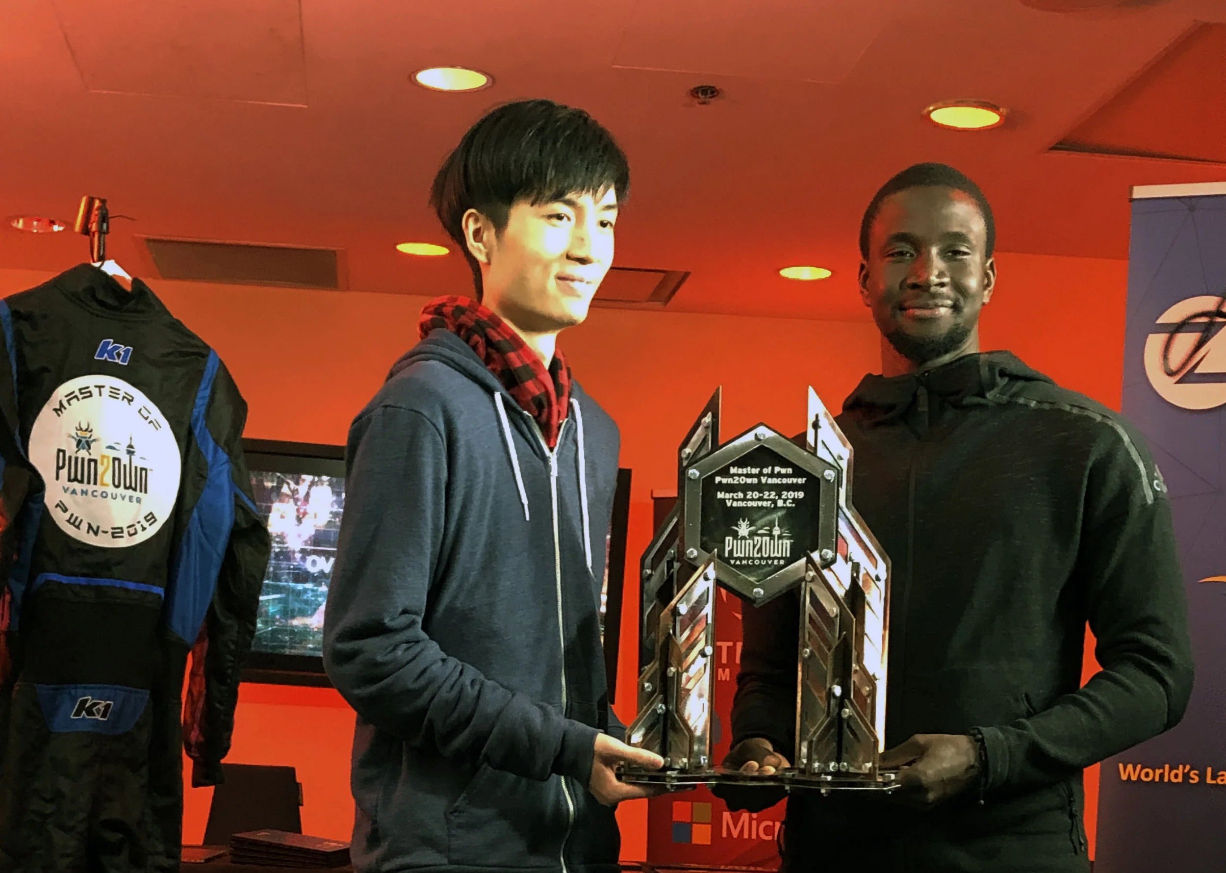 Master of Pwn winners Richard Zhu and Amat Cama - Team Fluoroacetate