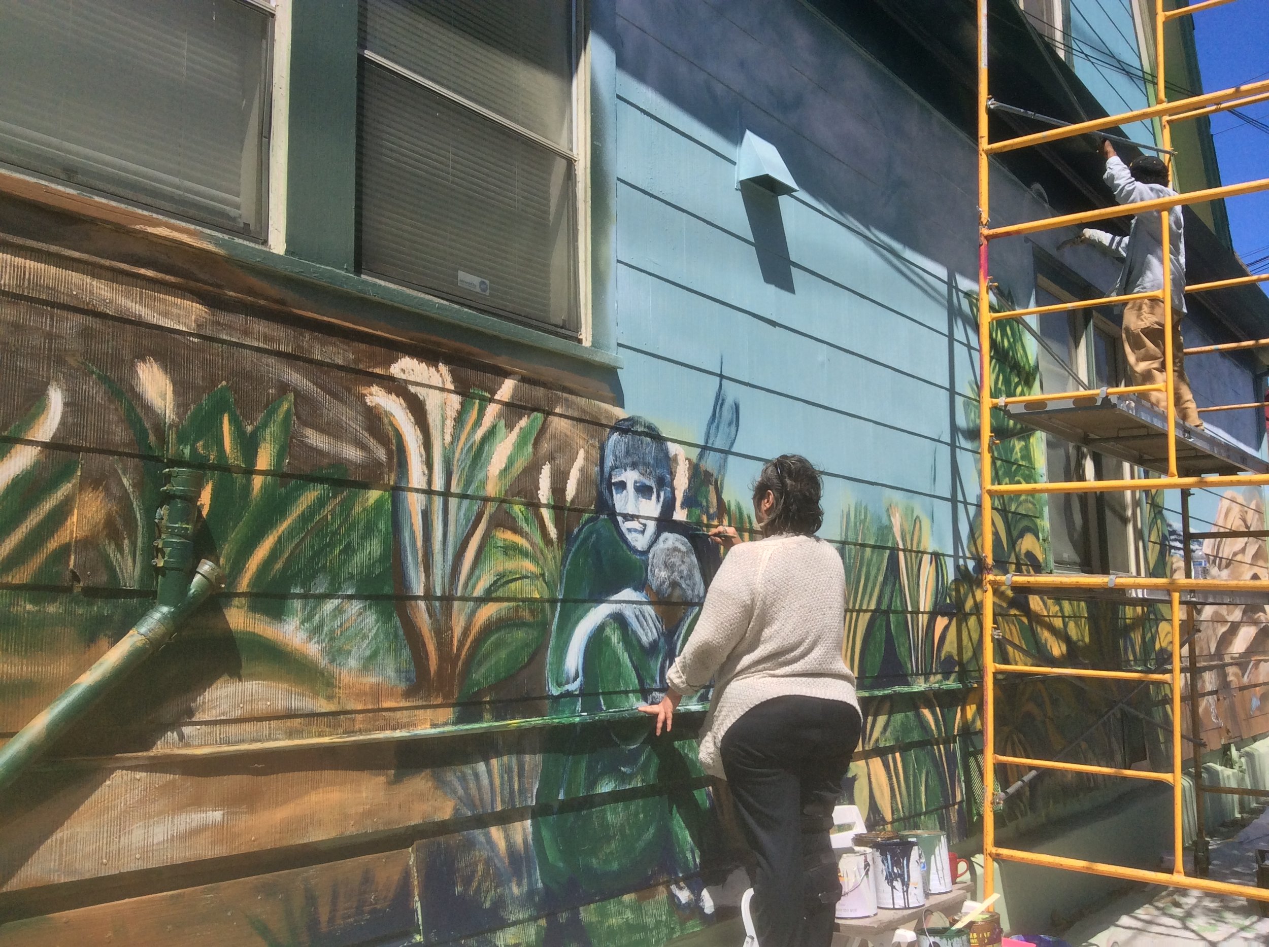 Veterans Artists, Ann Reesman and Pasha Evins working on VRP's "Faces of Veterans Through Artistic Expression" Mural Project