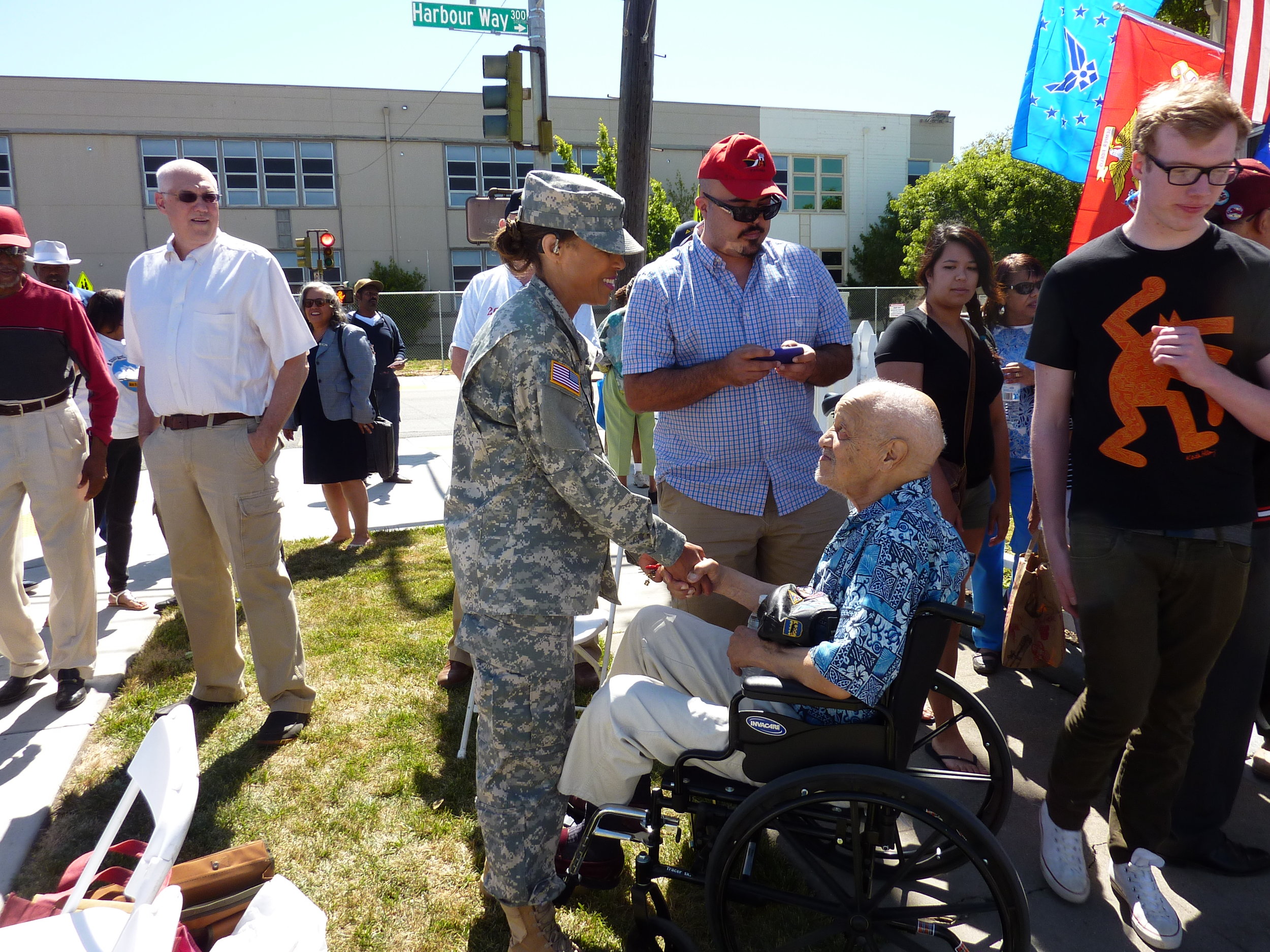 Rhonda Harris, VRP's Executive Director greets a veteran Tuskegee Airman. 