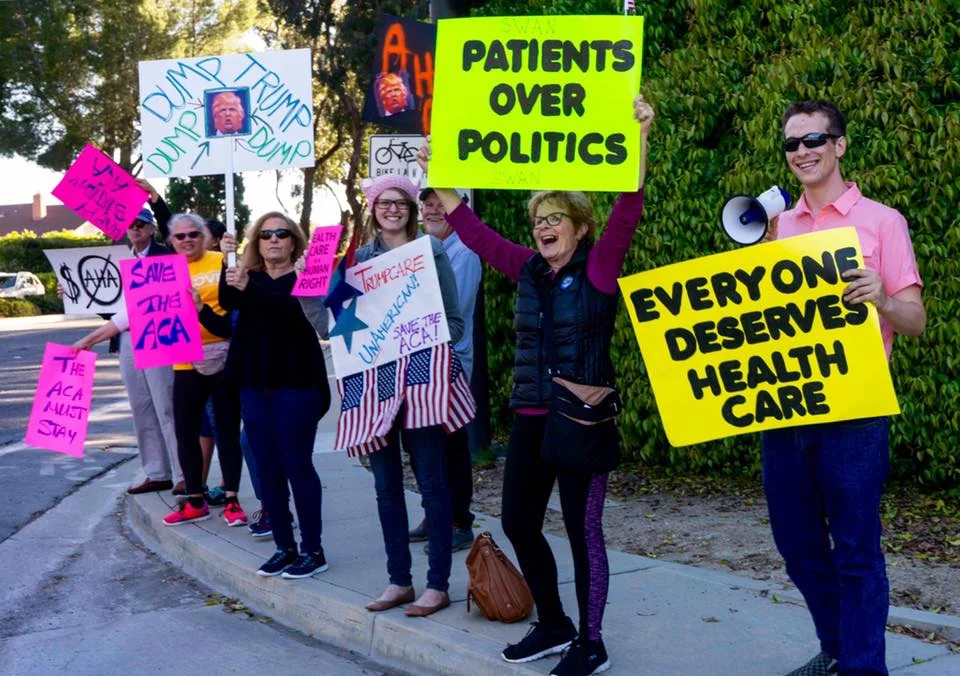 Indivisible: Conejo Activists Rally for ACA at Los Robles On Thursday, March 23, about 60 activists organized by Indivisible: Conejo's Healthcare Action Team and the Suburban Women's Advocacy Network celebrated the Affordable Care Act's birthday, and protested Republicans' plans to replace it, by taking to the streets outside Los Robles Hospital Center in Thousand Oaks. Supporters covered all four corners of the busy intersection, and even inspired passersby to stop and join in. A steady stream of approving car horns and cheers of demonstrated that the ACA enjoys immense public support -- making it particularly satisfying when Republicans were forced to pull their bill the next day. Congratulations to the Healthcare Action Team for its great work in organizing the rally!
