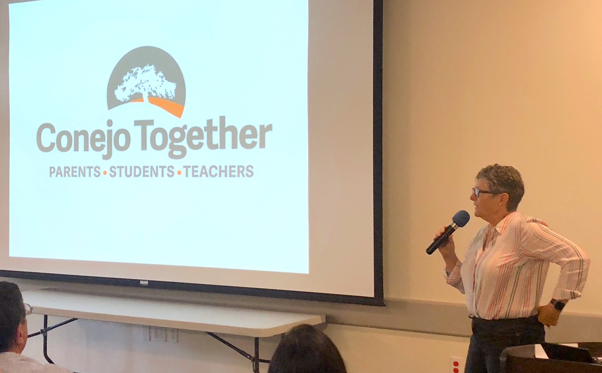 Conejo Together co-founder Mary Anne Van Zuyle presents the group's efforts during our ON TO VICTORY! General Meeting on August 19.