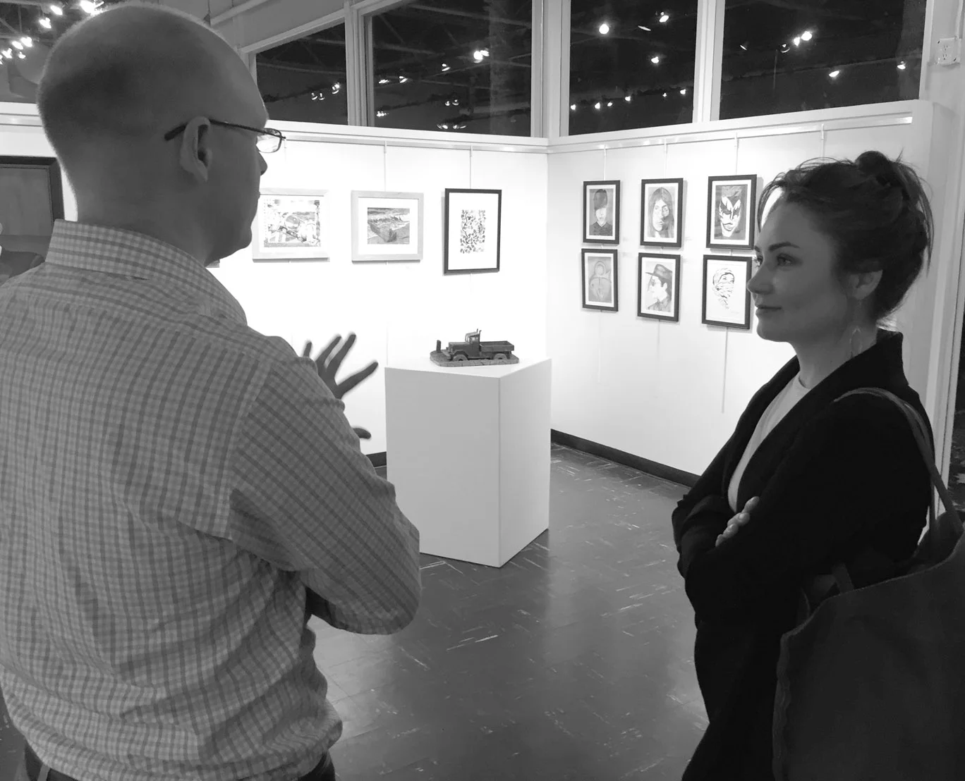 Captive Art show coordinator Daniel Shea with art therapist Nicole Barquist