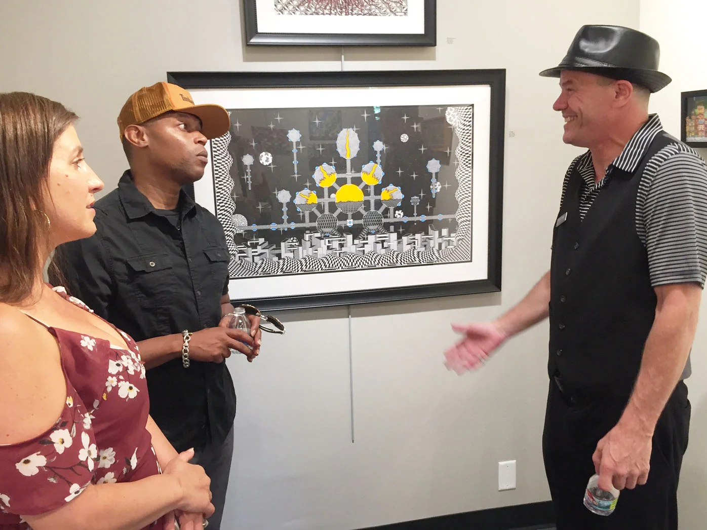 Ron Jones (right) with opening night guests