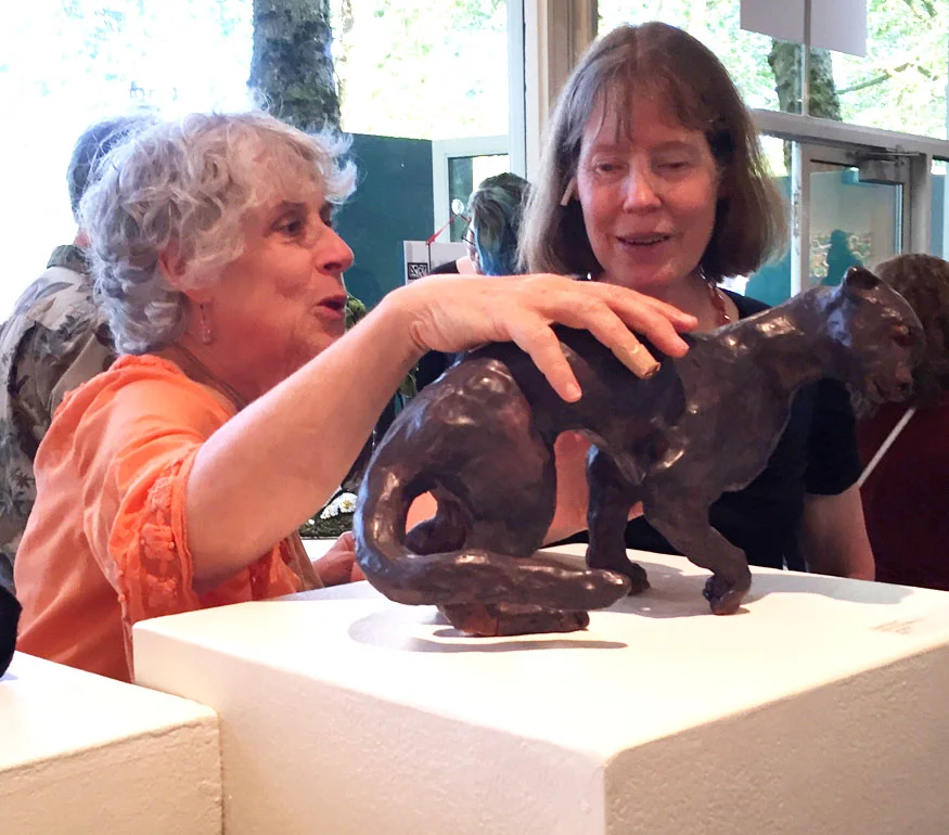 Please Touch show curator Barbara Oswald (left) with opening night guest