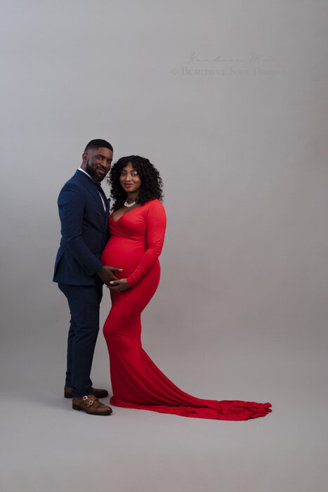 Maternity Couple in Red