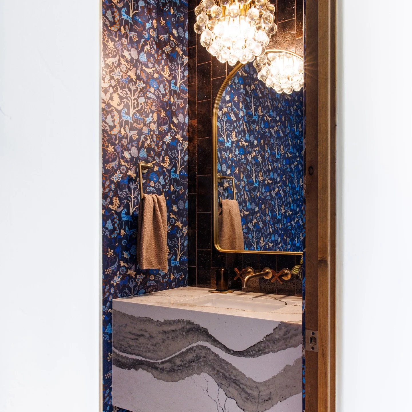 A little peak around the corner reveals this exciting powder room. The client was willing to do something really fun here and we had a blast designing this for her. 

Photo by @lindsey_king_photography