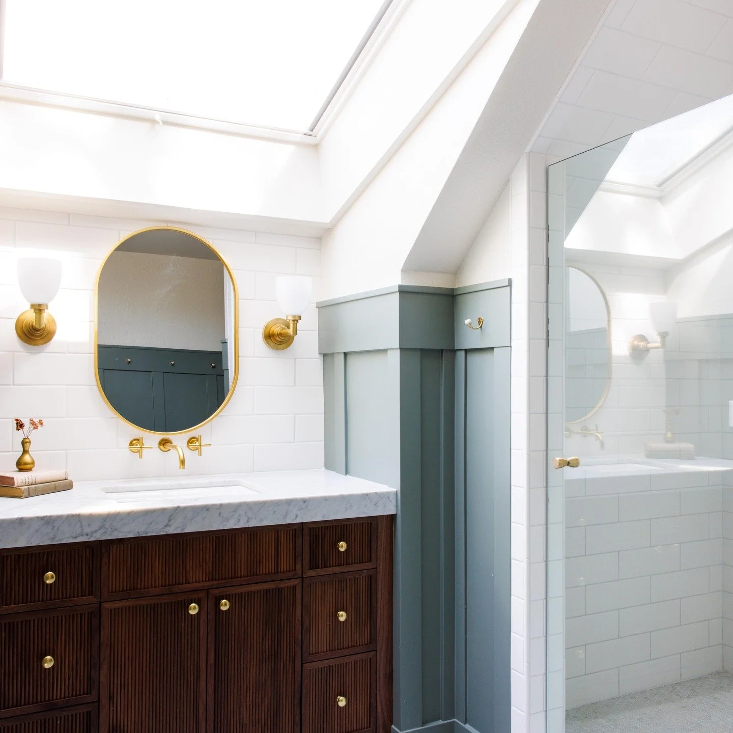 We love designing homes that have history, helping to maintain some of the original charm while updating. How amazing is that skylight?