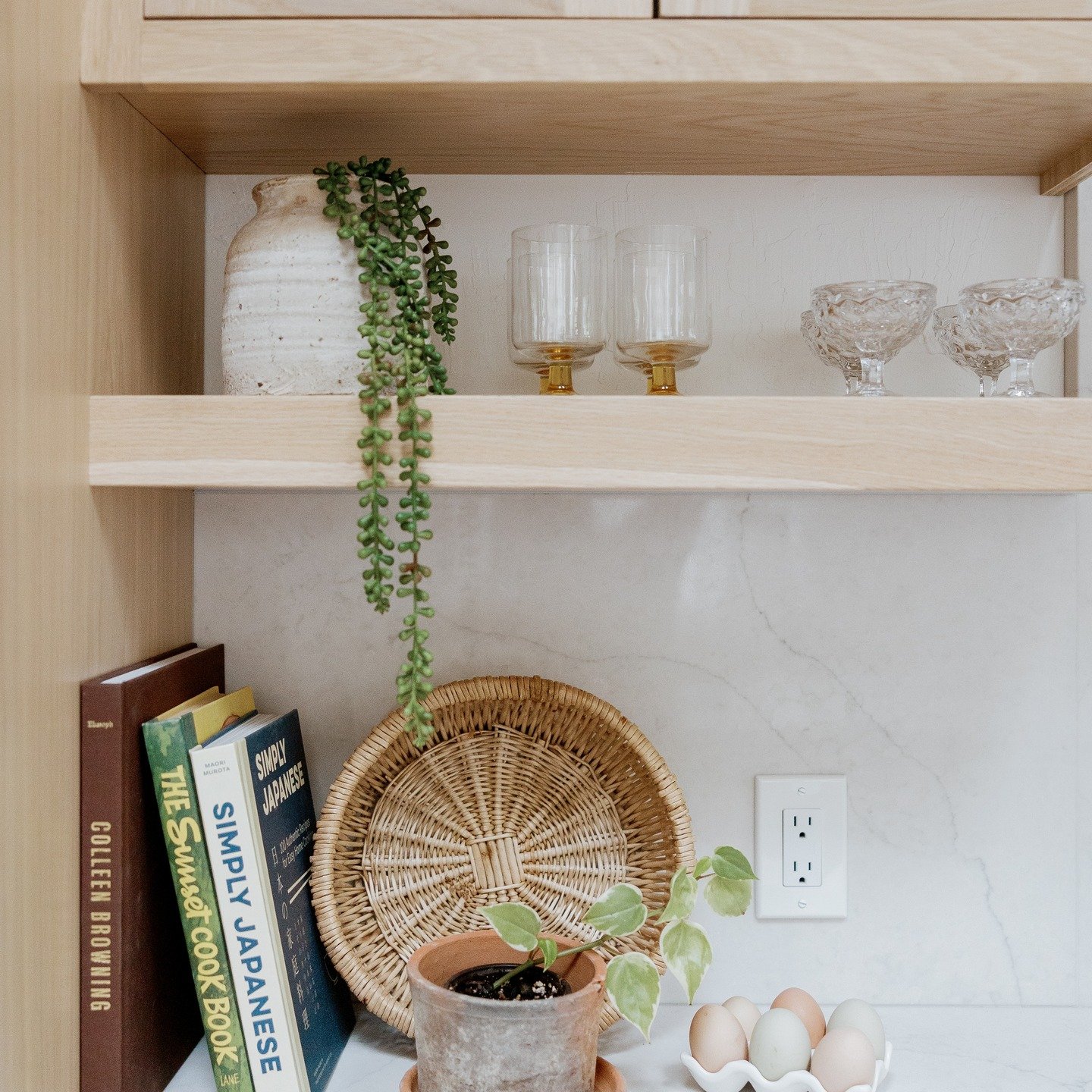 Shelf styling can feel overwhelming. Our simple tip is to simplify. It's easy to keep adding items thinking this will make it feel finished but in reality if makes it feel cluttered and unintentional. Pick a handful of items that communicate the stor