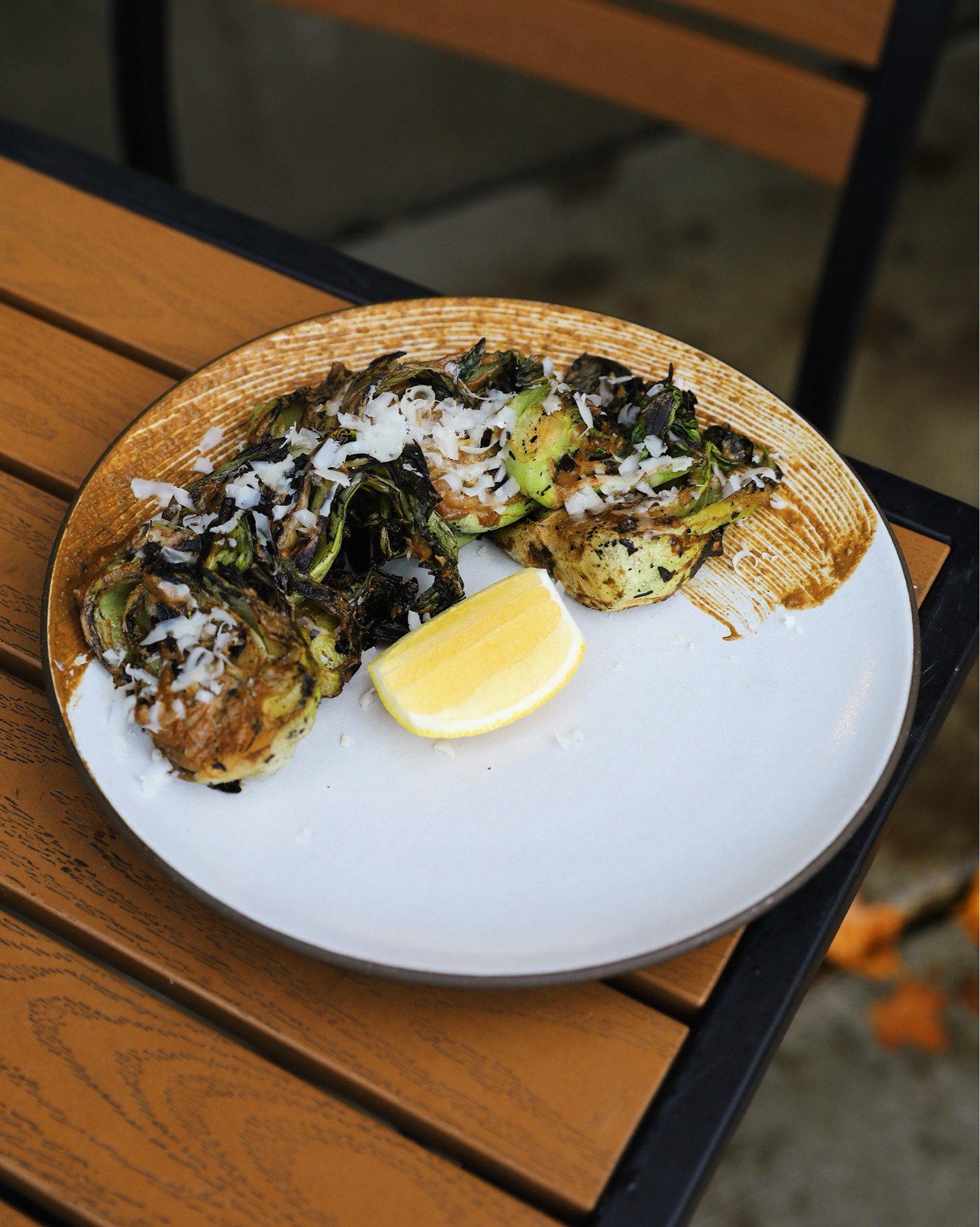 Meet one of our new starters: Roasted Bok Choy. Savory and acidic in just the right way. Featuring charred bok choy, coated with a black garlic, anchovy, and caper sauce. Finished with grana padano and pistachios.