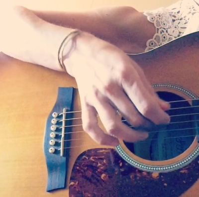 Me practicing and practicing and practicing "finger style." The goal is to keep your fingers very very small and compact on the strings, not wildly flailing about as mine are wont to do. 