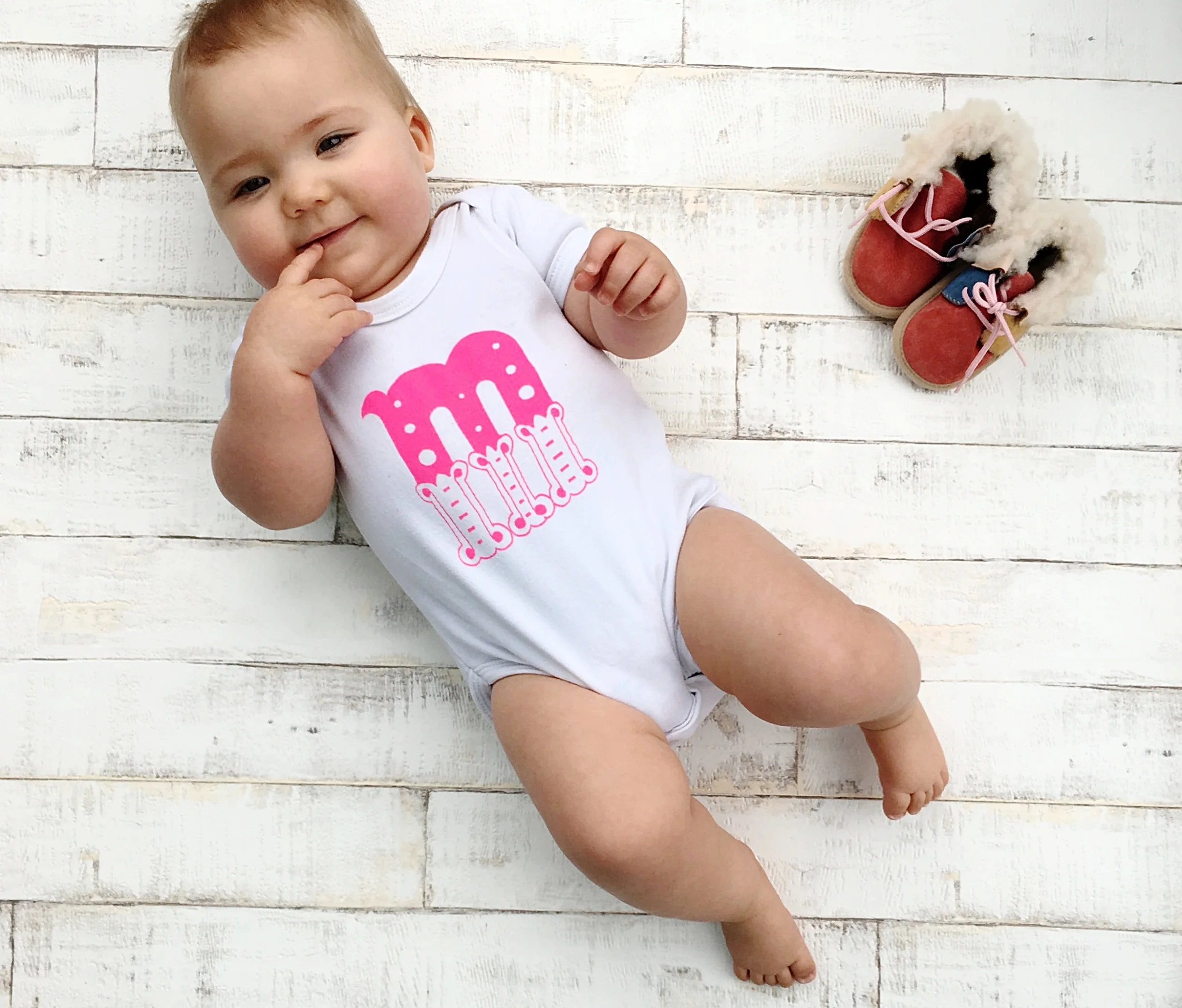 Personalised organic baby bodysuit in your choice of letter and colour