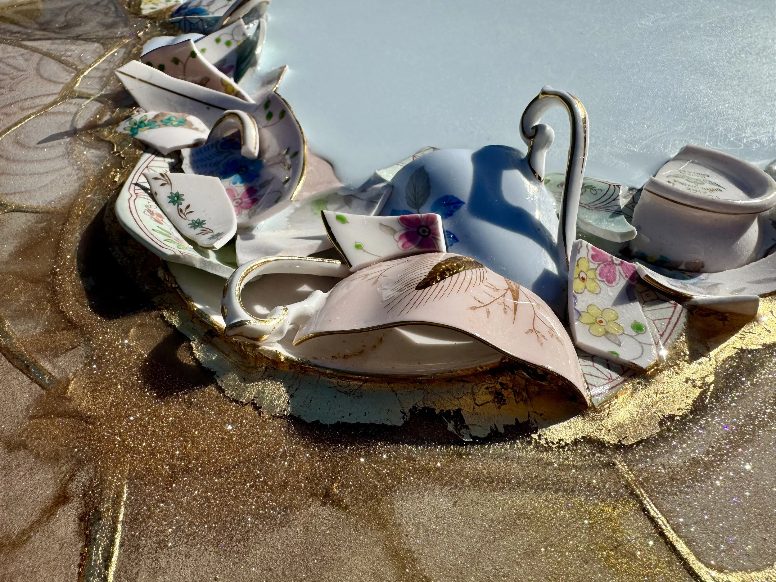 Family heirloom wall art reassembled into new composition