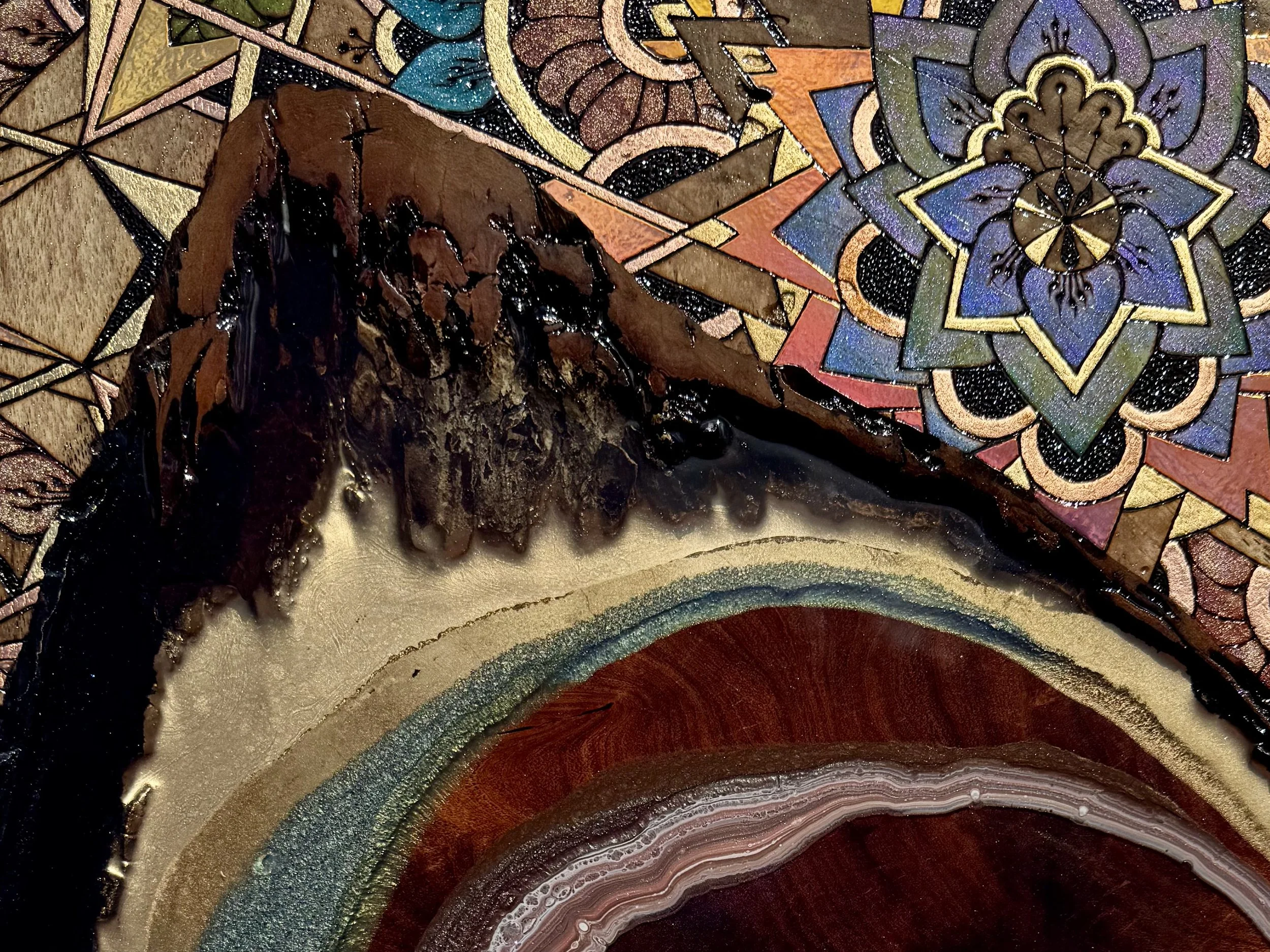 Luminous resin, hand-shaped geometry, and natural materials come together in this layered art panel for the wall.