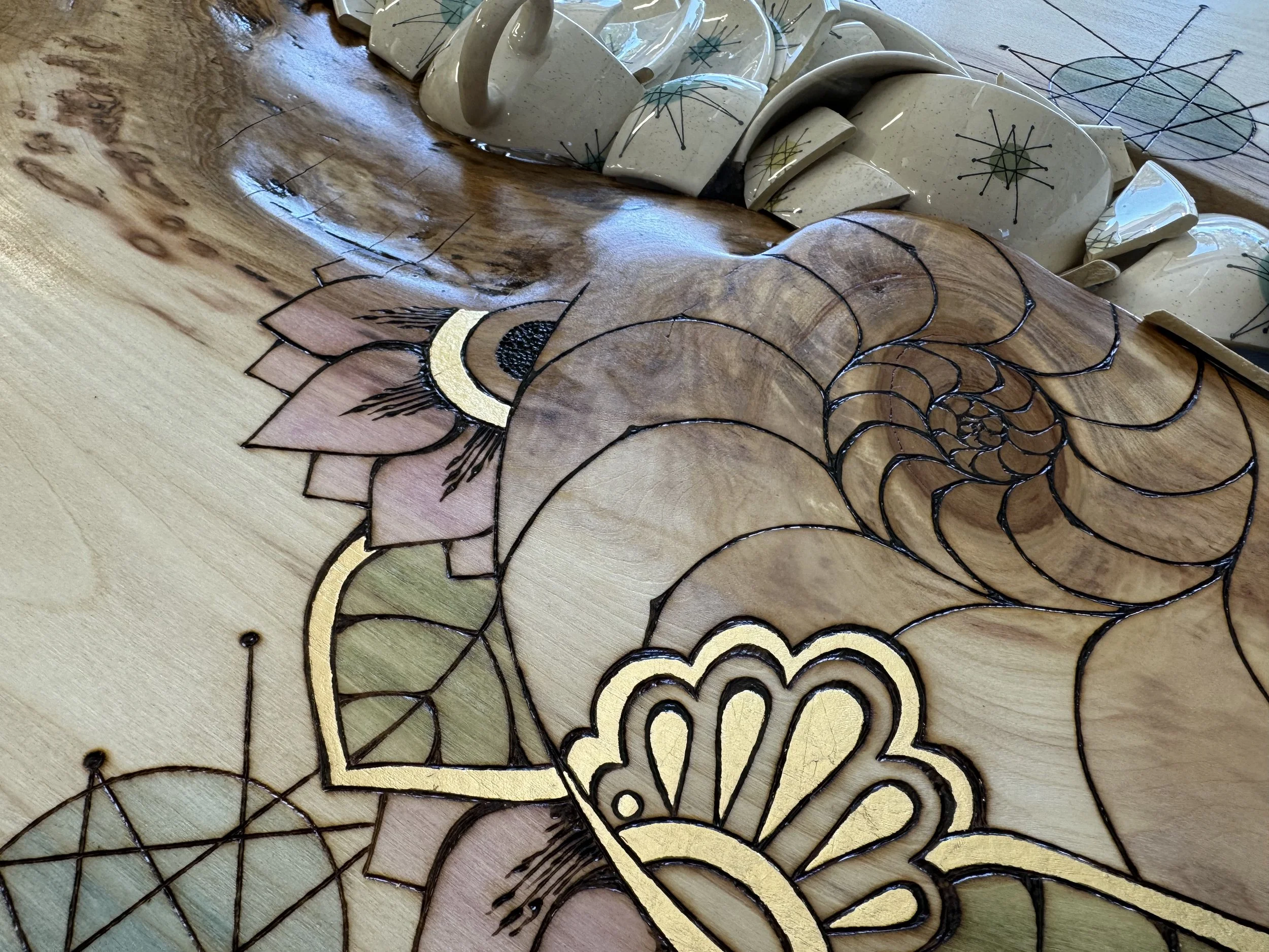 Vintage dish patterns woven into mixed media wall art surface