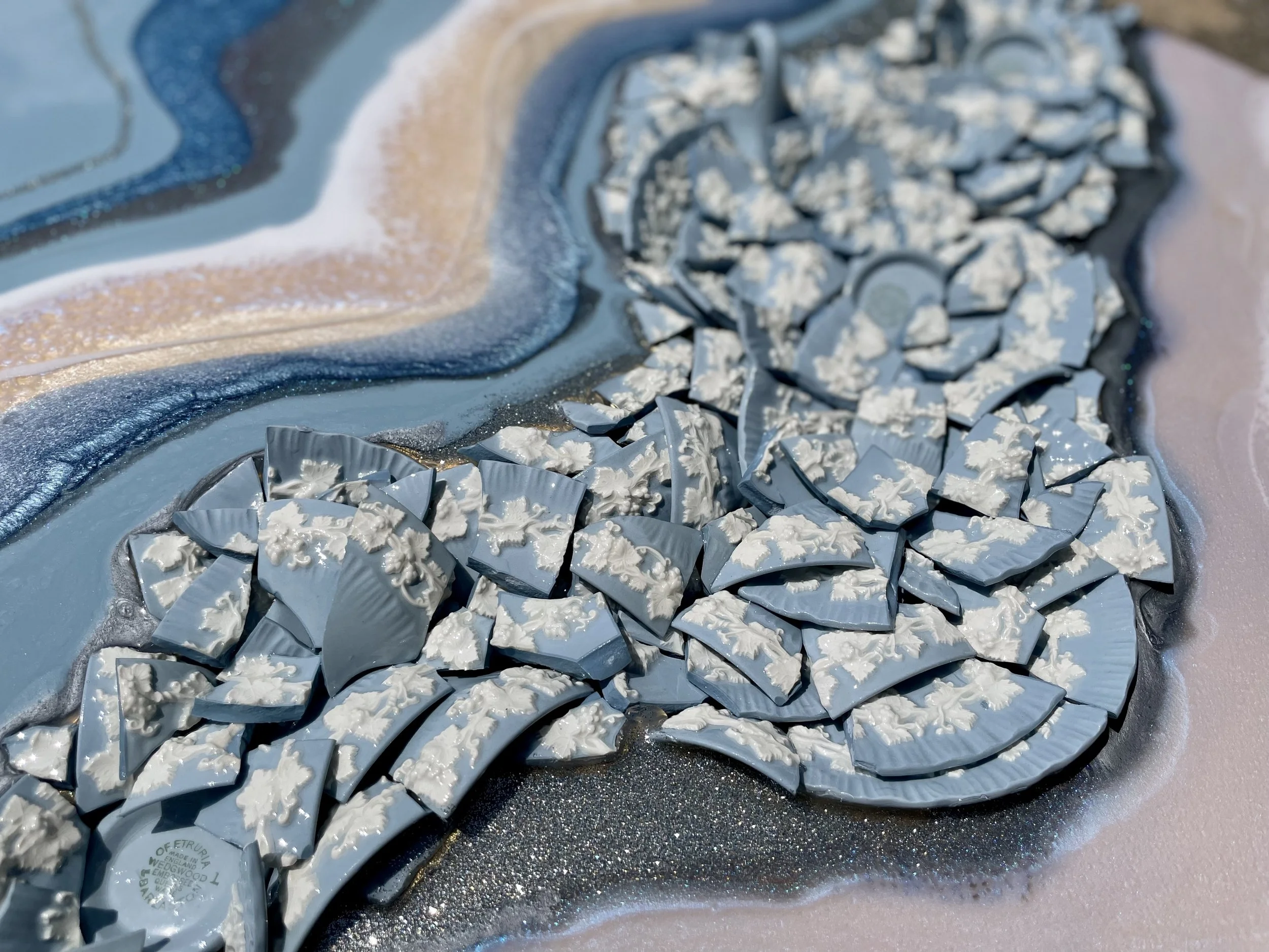 Symbolic wall art holding memory and continuity through vintage materials