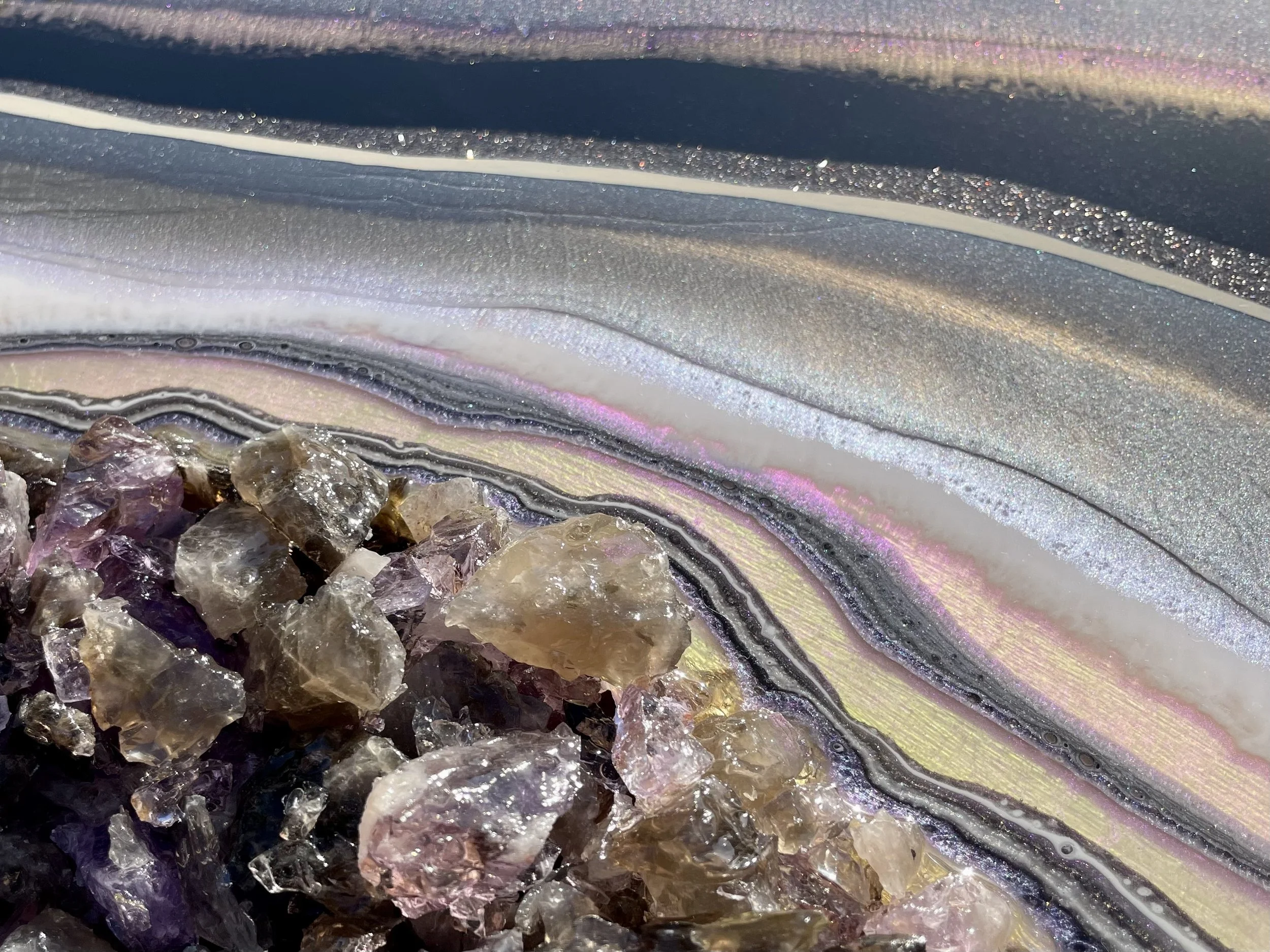 Detail view of crystal geode wall art with layered texture