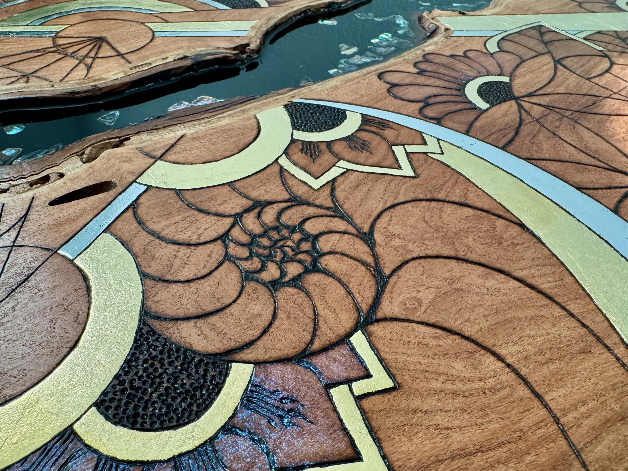 Hand-burned Texas mesquite artwork Metamorphosis by Austin artist Anne Shackelford.