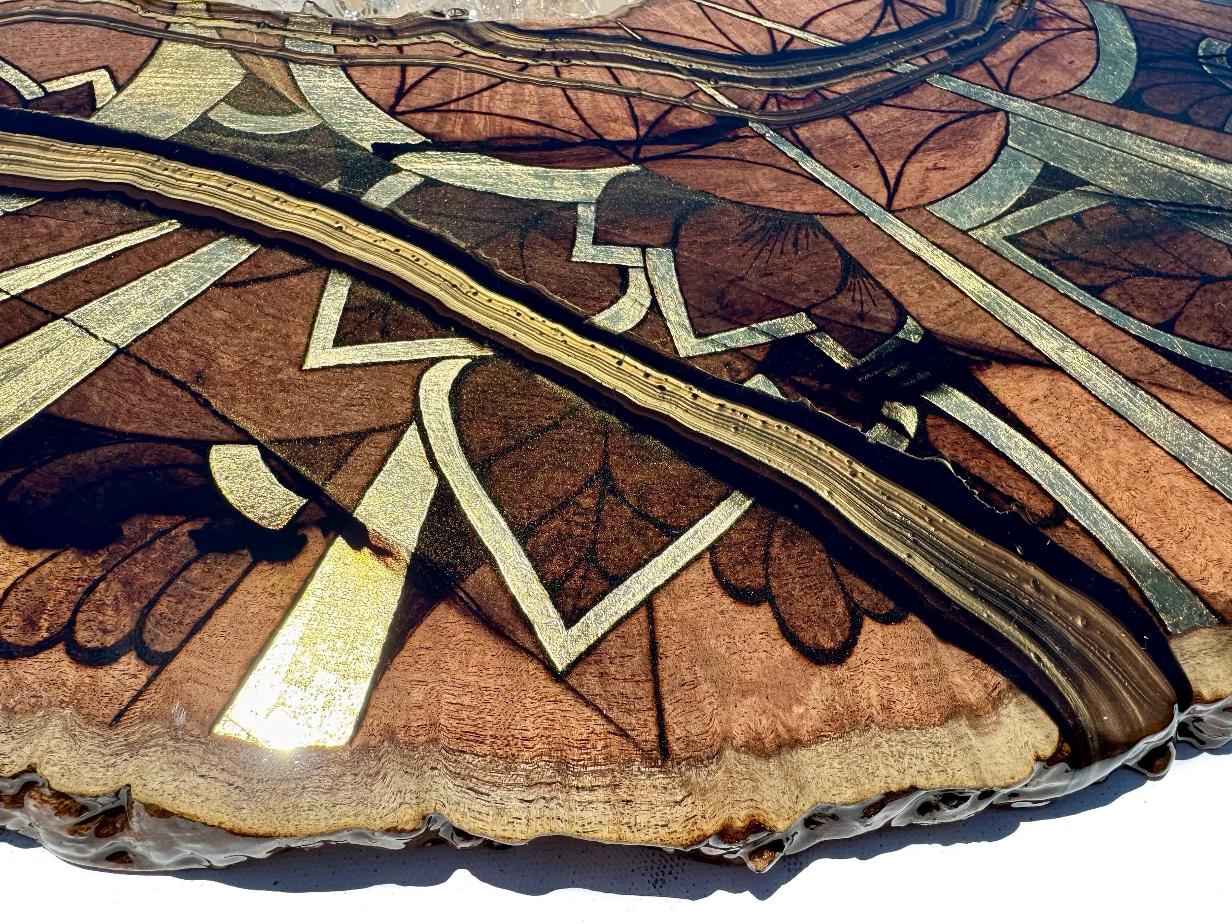 Crafted with pyrography and resin on Texas mesquite, inlaid with gold leaf, covered in resin, clear quartz crystals, alcohol ink and love.  Measures 45x18", 14lbs, Made in 2024.