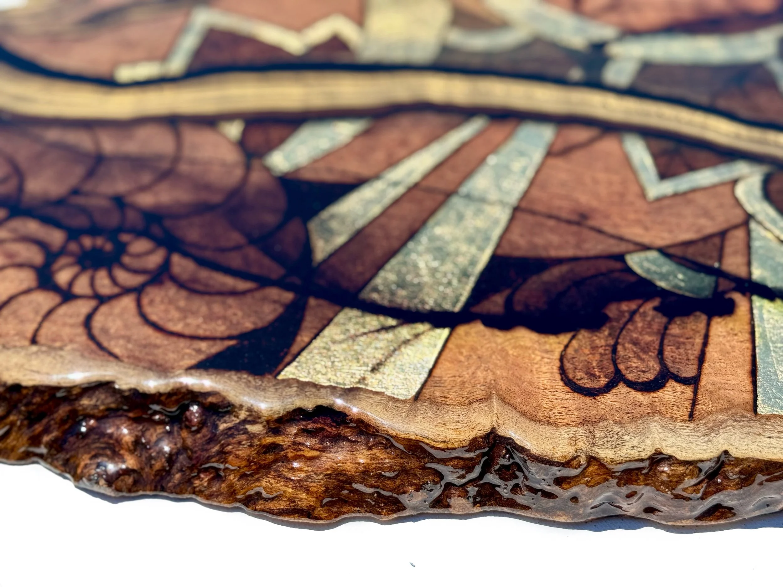 Crafted with pyrography and resin on Texas mesquite, inlaid with gold leaf, covered in resin, clear quartz crystals, alcohol ink and love.  Measures 45x18", 14lbs, Made in 2024.