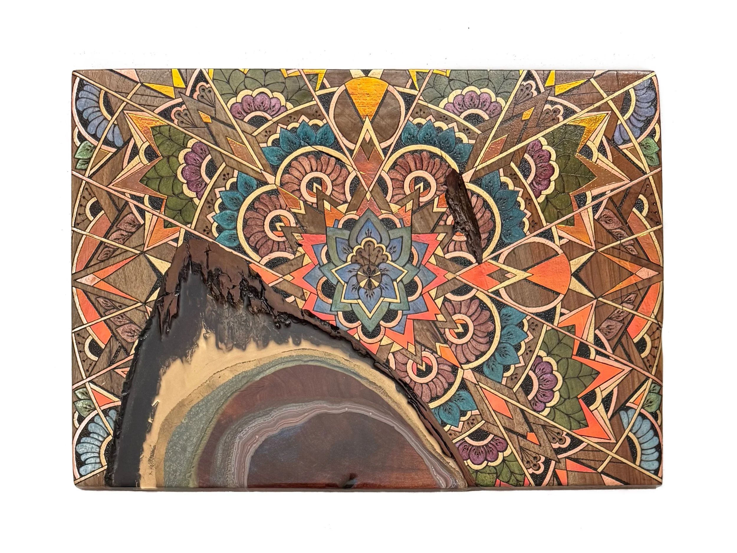   Where the Pattern Flows , a 2025 wall art piece by Anne Shackelford, features intricate floral designs wood burned into walnut with vibrant color and detail. A resin river highlights the natural edge of repurposed mesquite, creating a striking inte