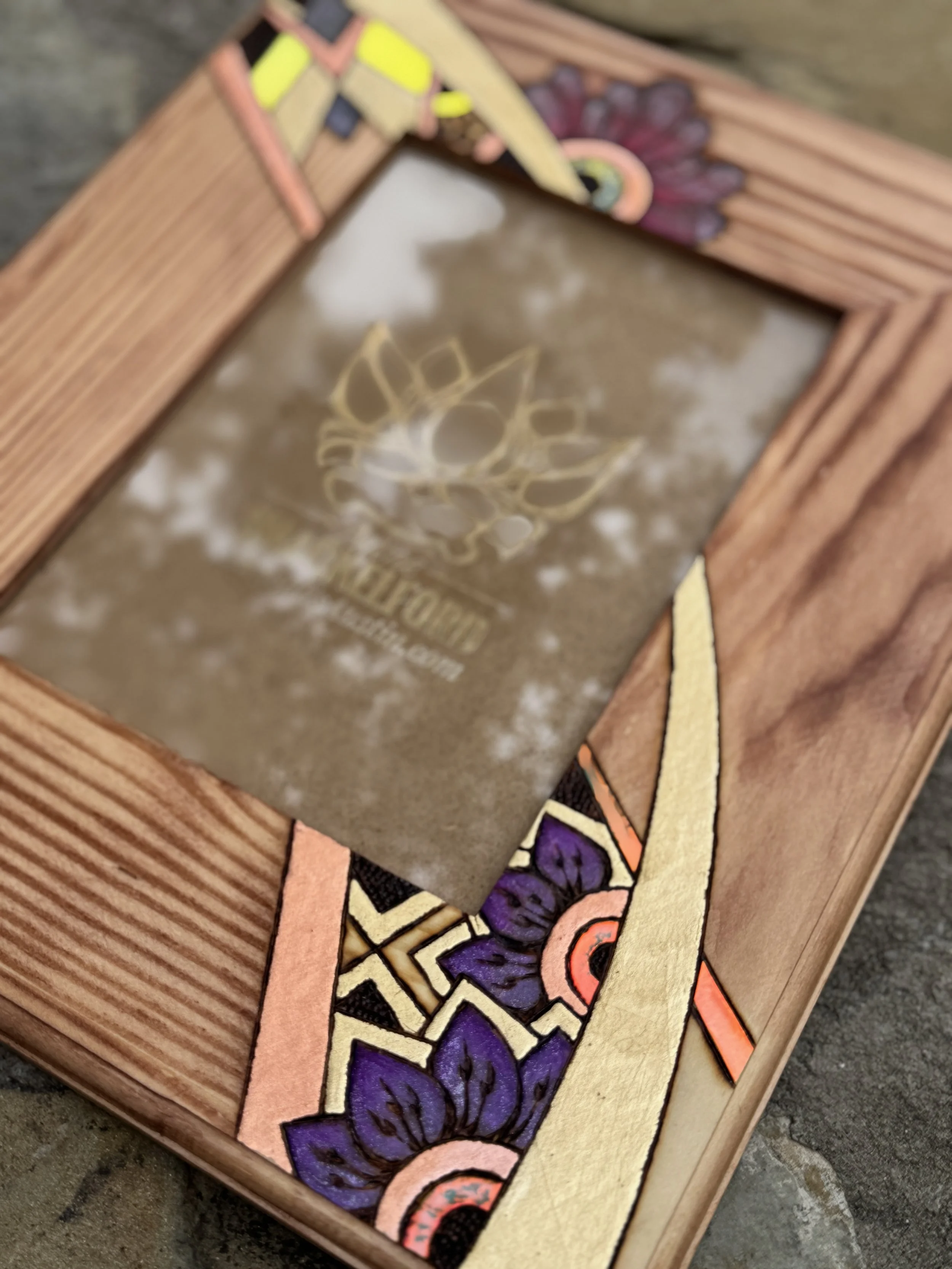 Handcrafted Firelight Frame by Austin artist Anne Shackelford, functional wood art.