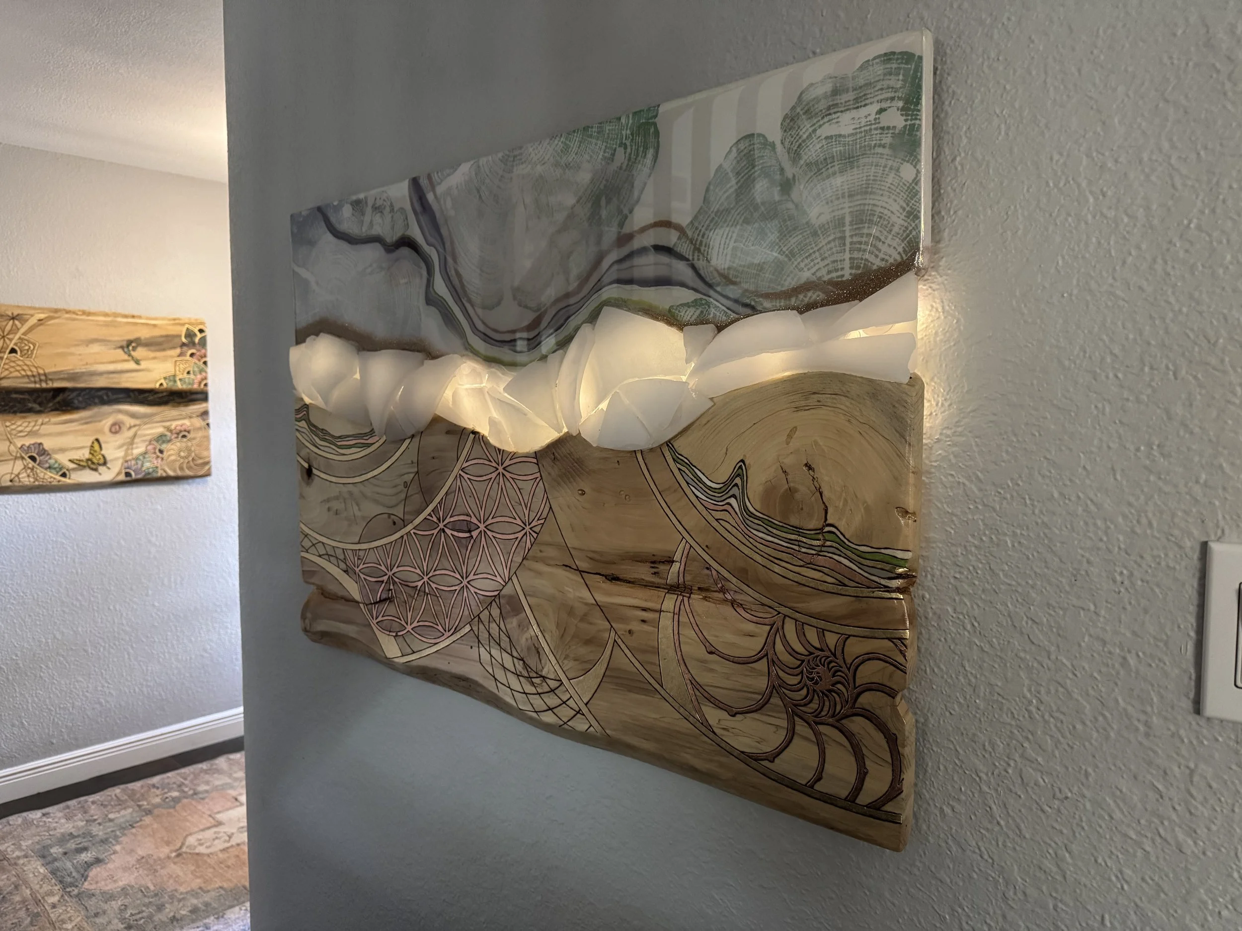 Mixed media wall art with holographic film, resin, and alcohol ink