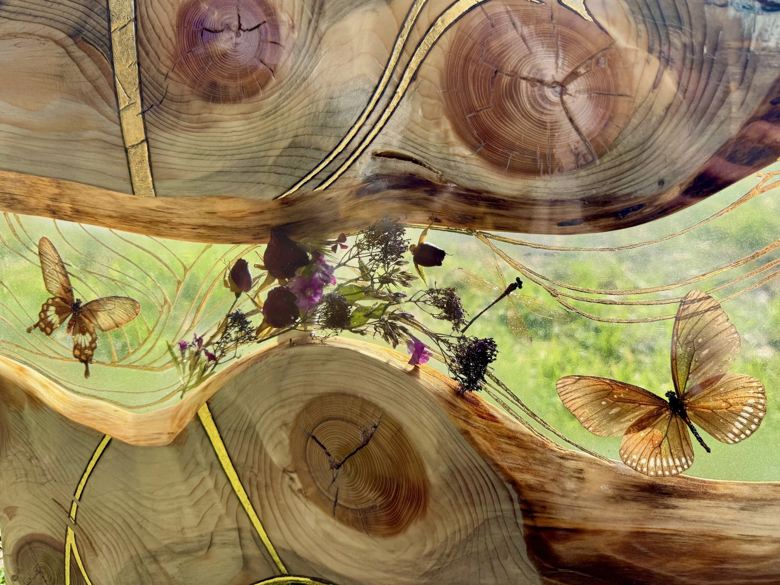 Hand-burned aspen wood artwork Lovers Carvings by Austin artist Anne Shackelford.