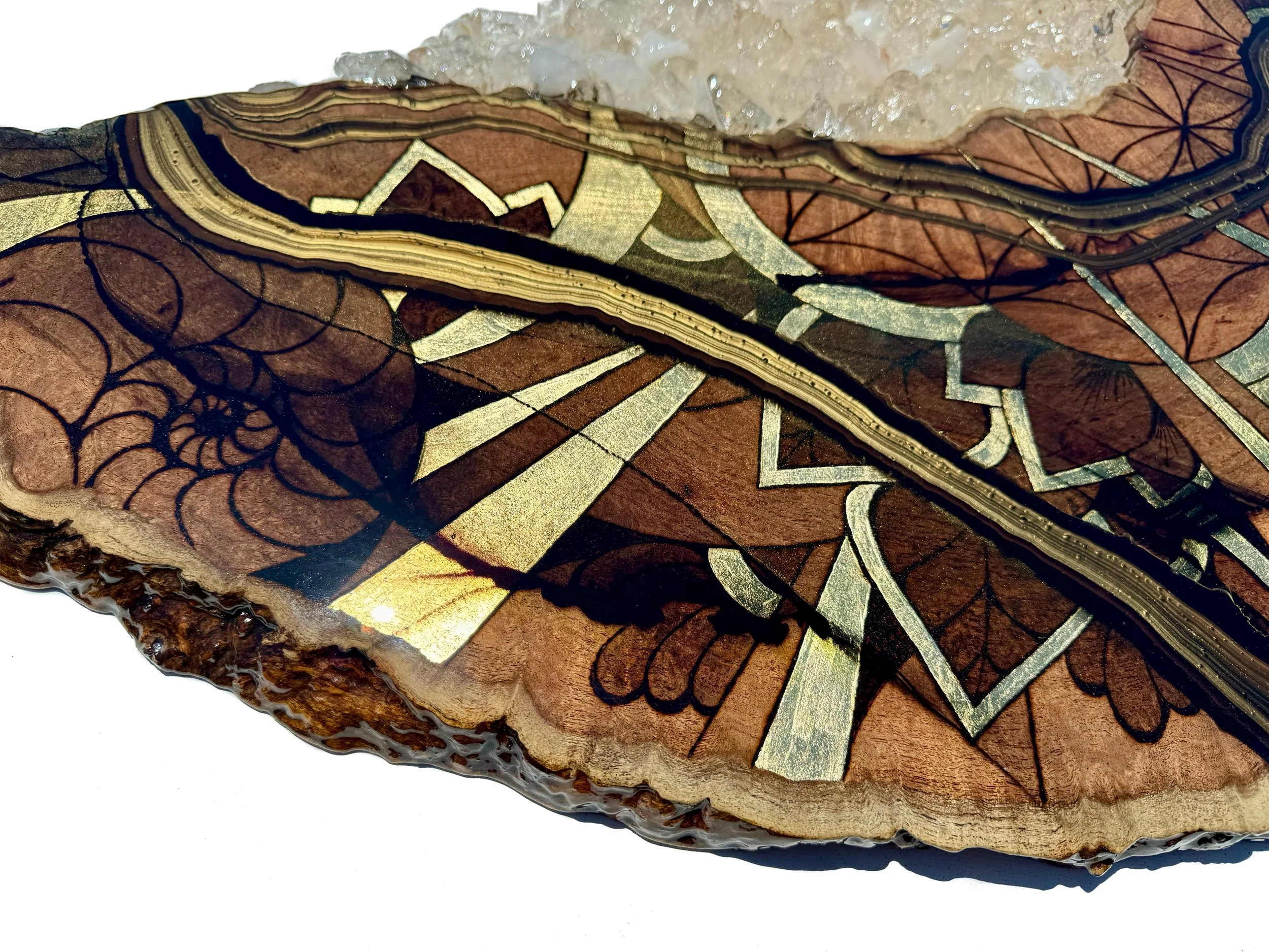 Contemporary wall art by Austin artist Anne Shackelford with burned wood, gold leaf, and crystal detail.