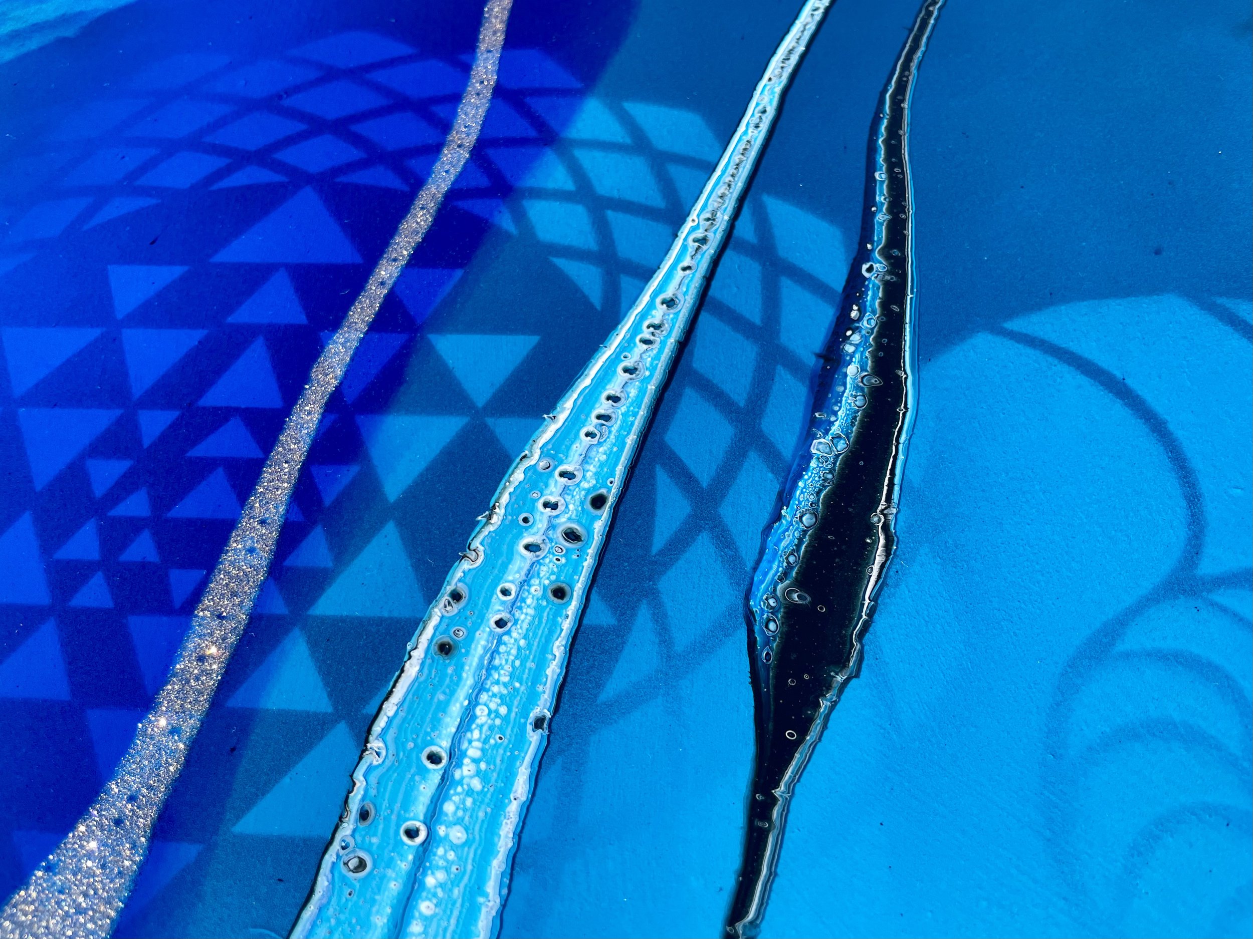 Bespoke door art for the home combining geometric design and luminous materials