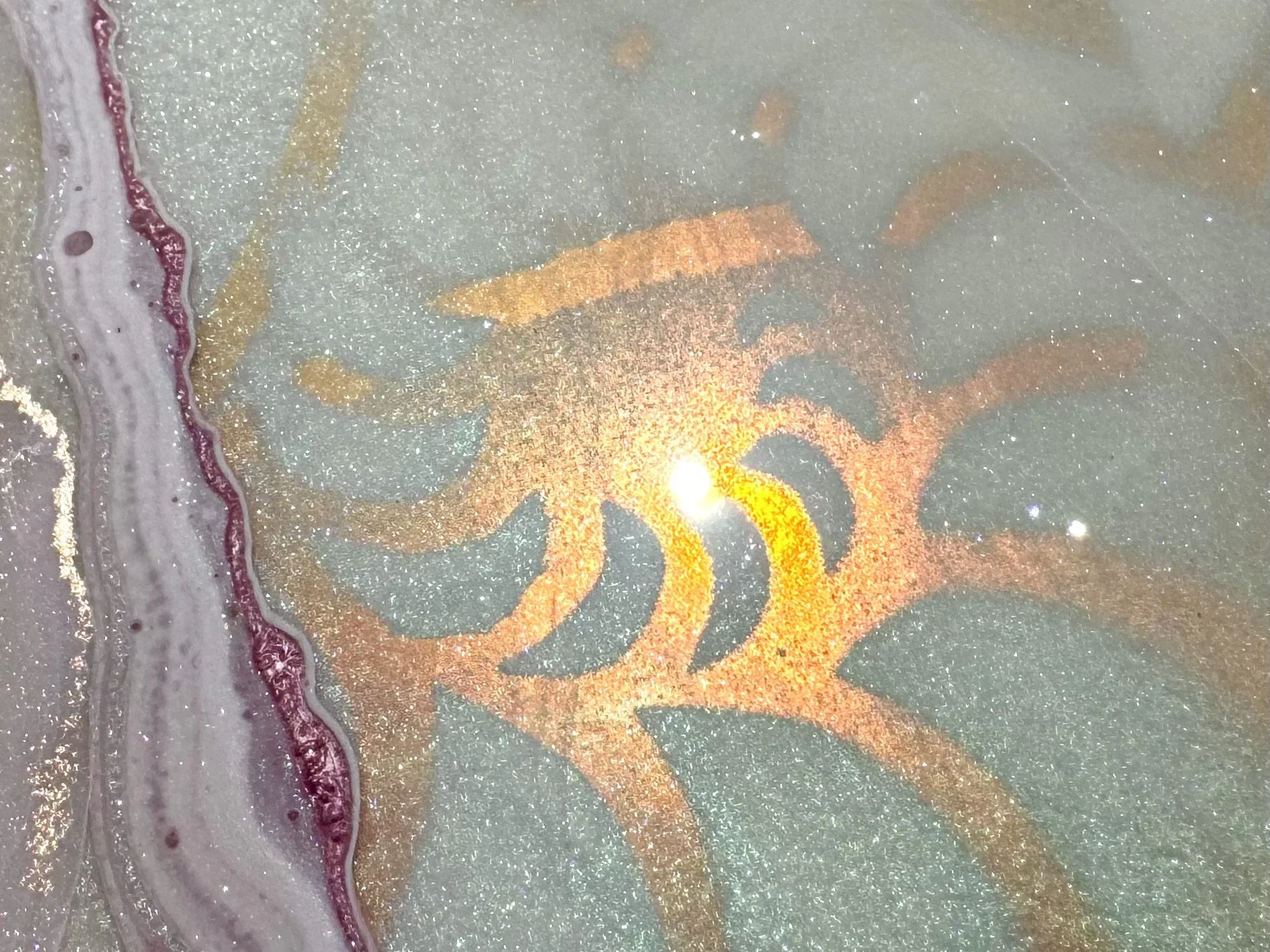 Sacred geometry wall art with translucent resin, radiant light fields, and subtle spiritual symbolism.