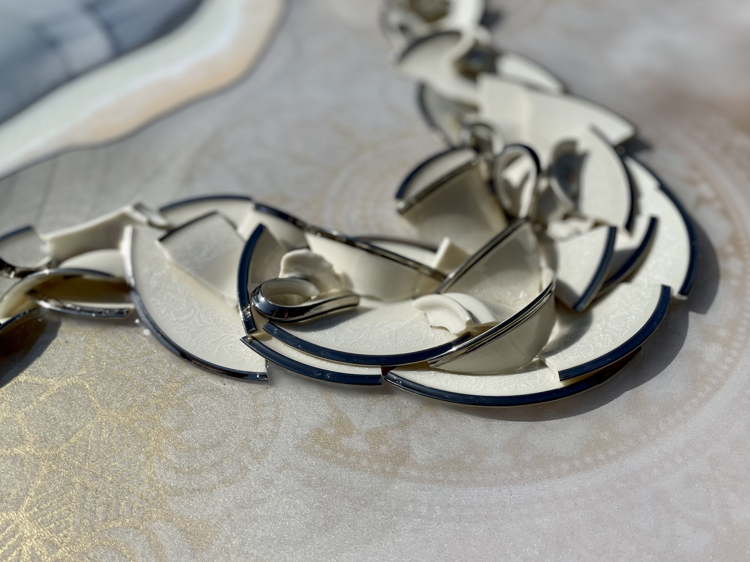 Original wall art crafted from family heirloom china and gold leaf