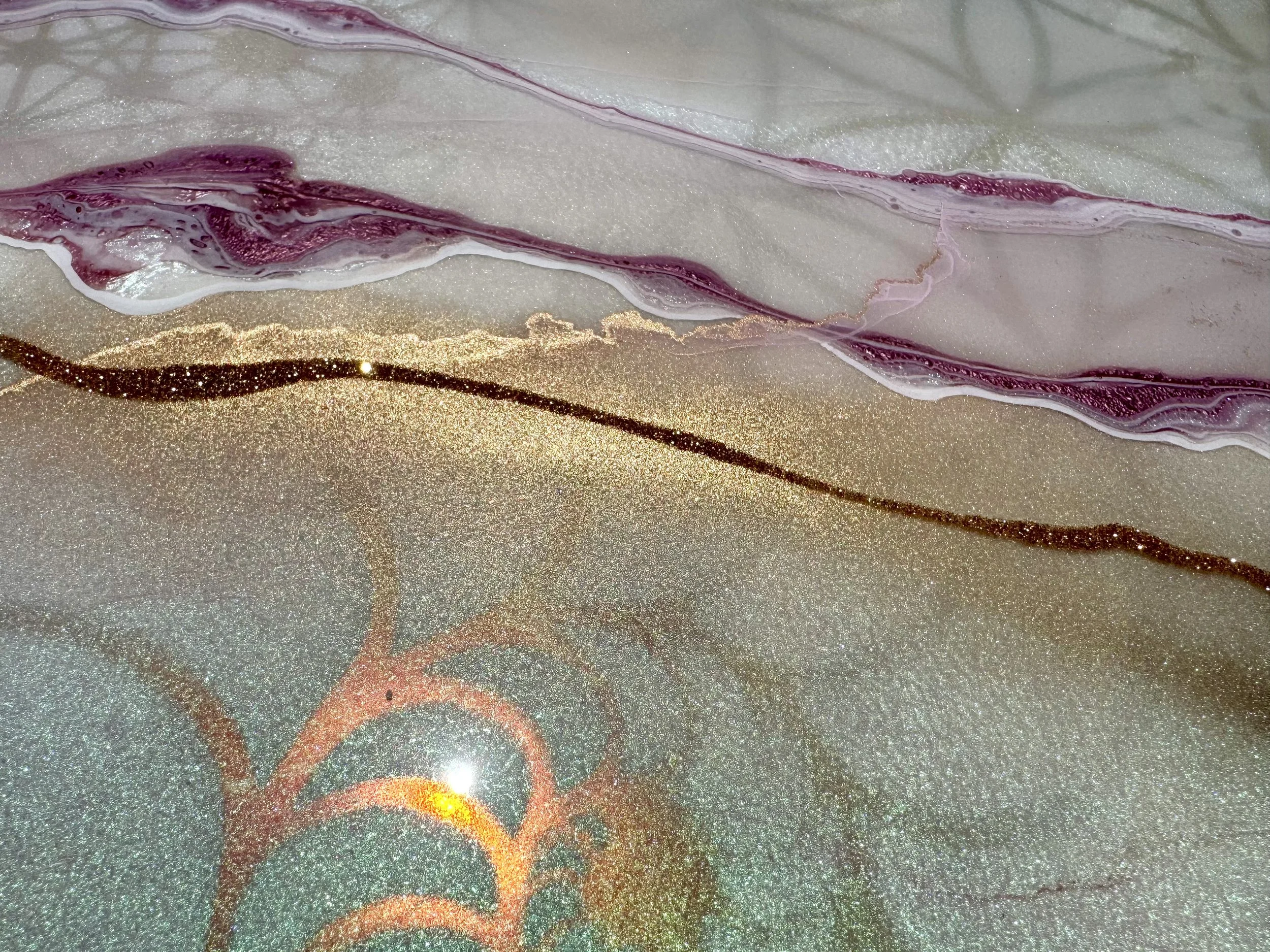 Close view of shimmering resin overlays and holographic detailing, part of Halo Code’s sacred geometry art series.