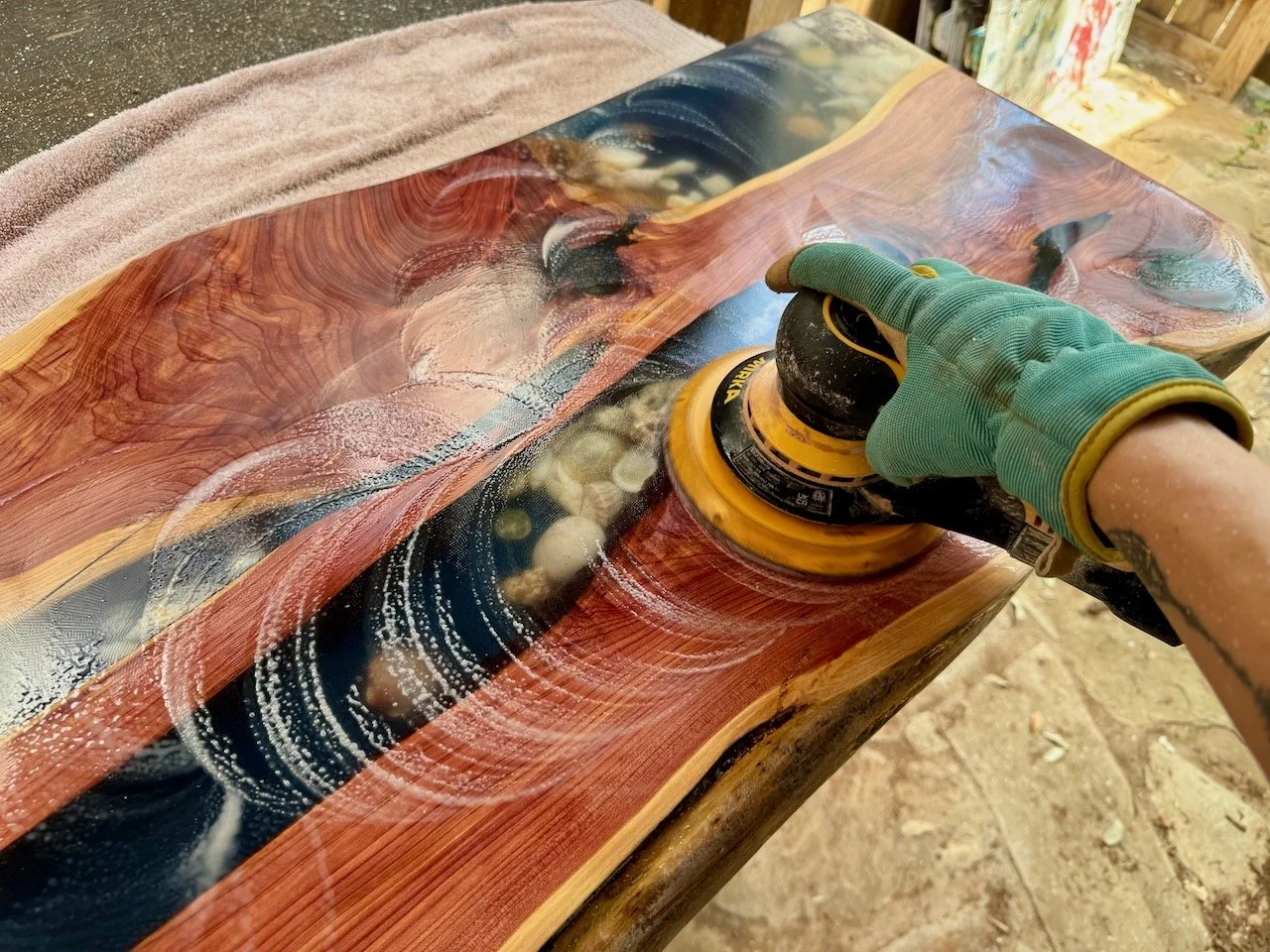 Juniper and resin artwork with coastal influence and warm undertones.