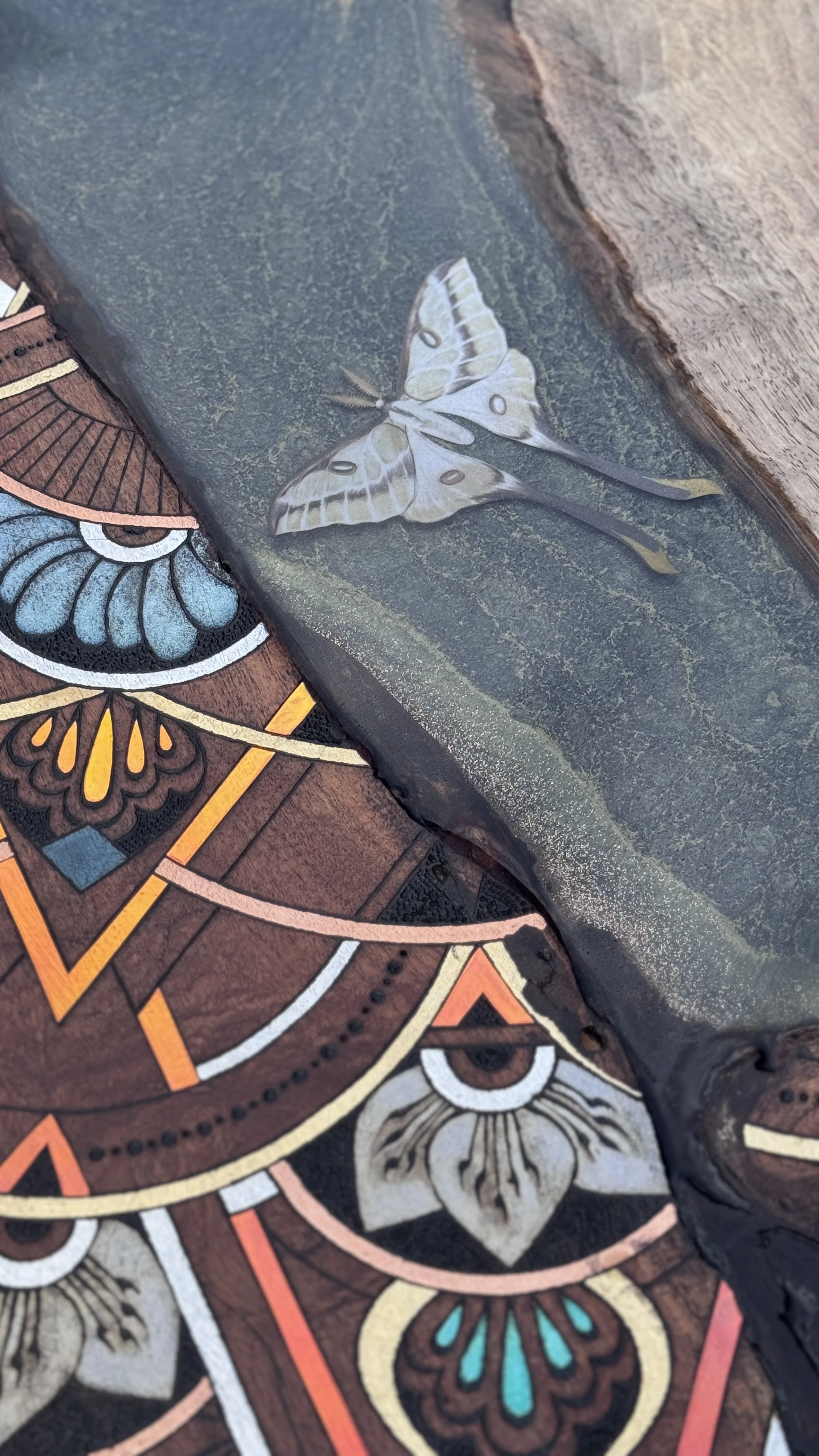 Texture detail from Alchemy of Becoming featuring layered mixed media materials and geometric patterning.