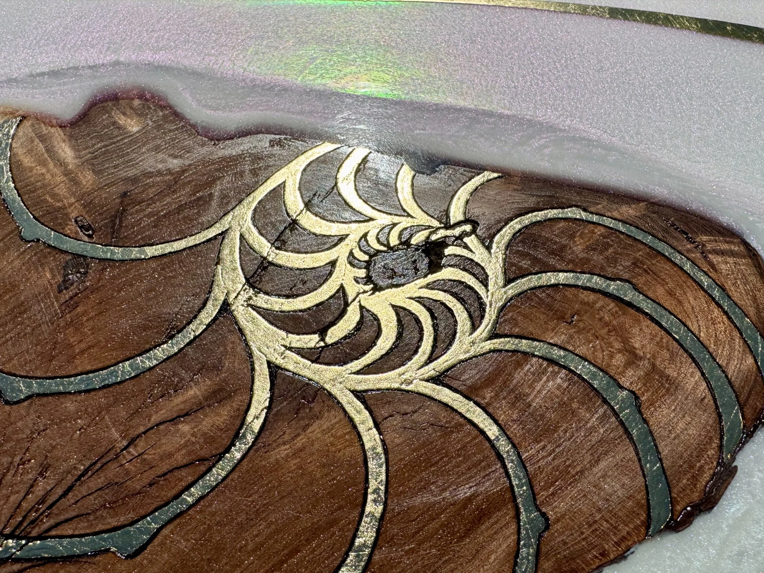 Mixed media snake wall art with layered resin surface