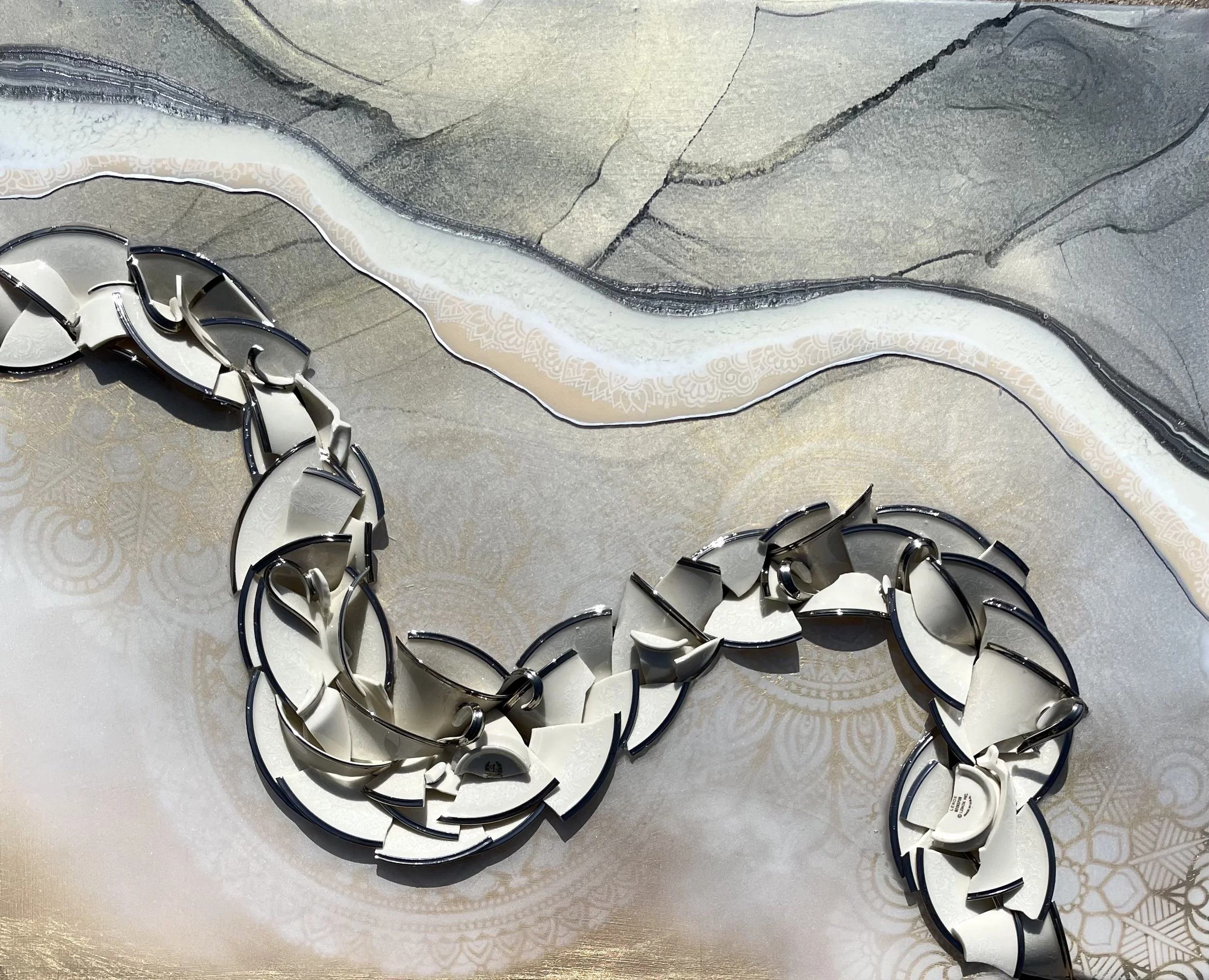 Aparigraha wall art by Austin Texas artist Anne Shackelford made with vintage china and resin