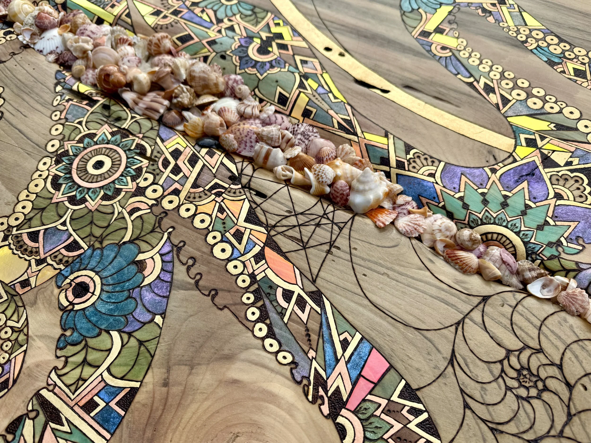 A celebration of lightplay and layered texture in contemporary marine-inspired pyrography.