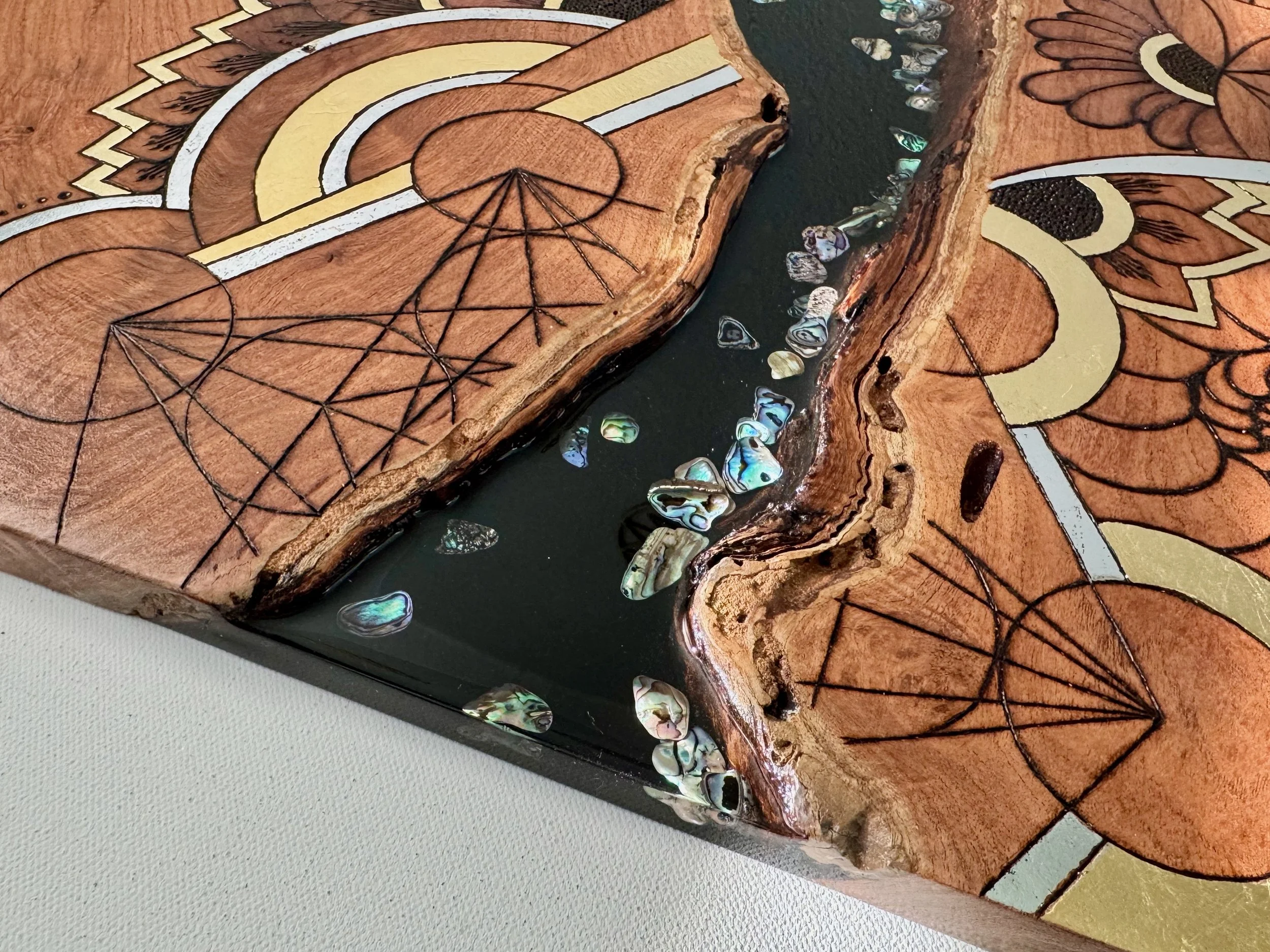 Textured mixed media artwork Metamorphosis by Anne Shackelford, abalone shell and resin detail.