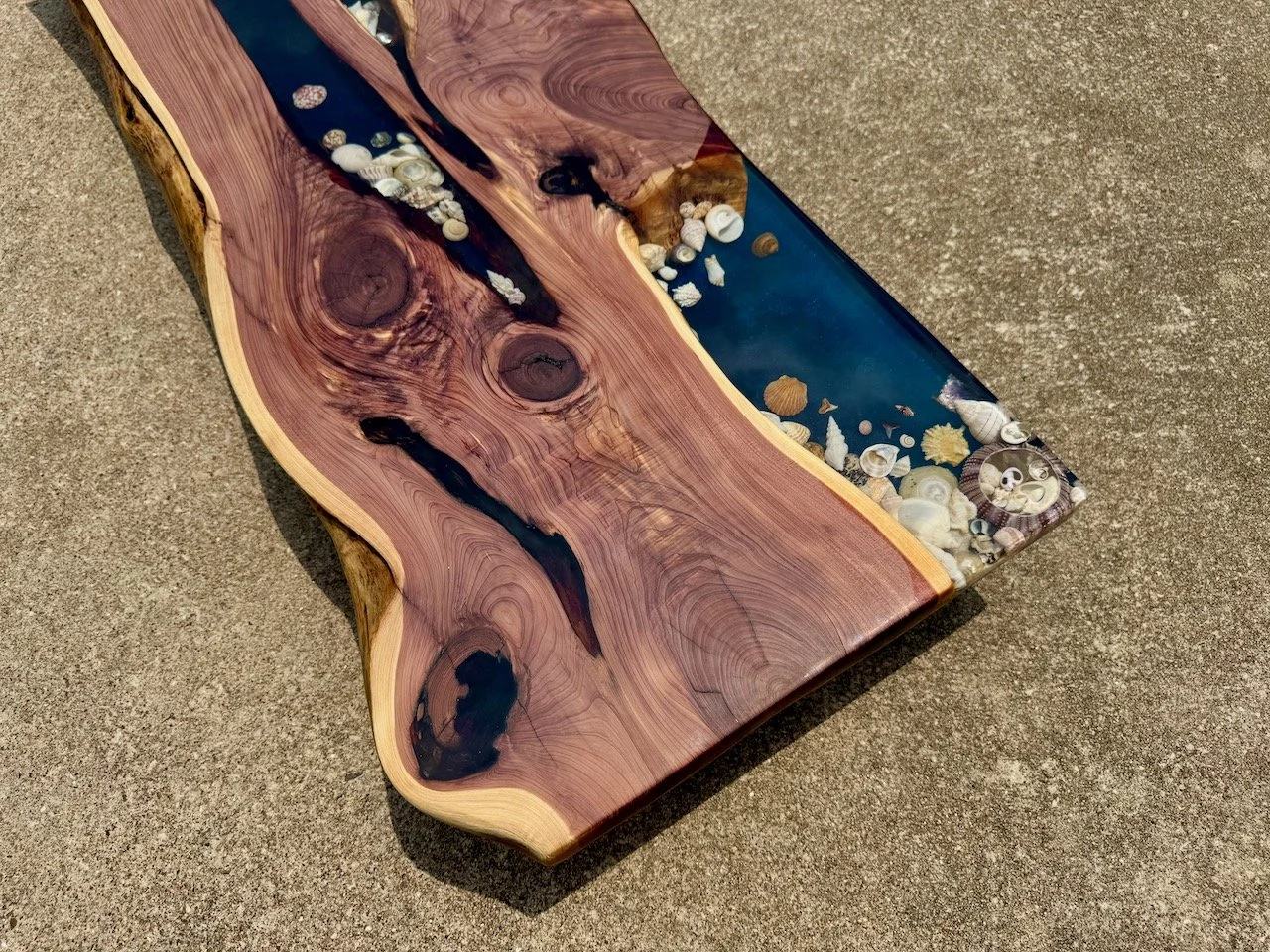 Handcrafted resin art table celebrating legacy and connection to nature.