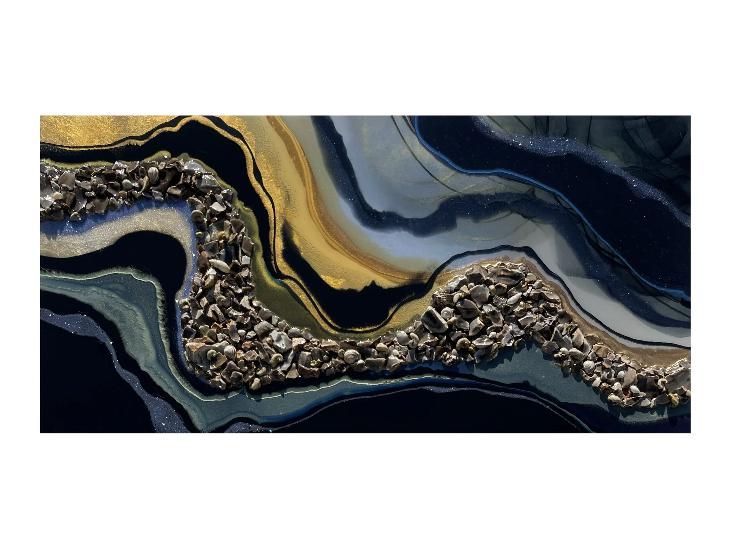 Flint rock wall art by Austin Texas artist Anne Shackelford with resin and gold leaf