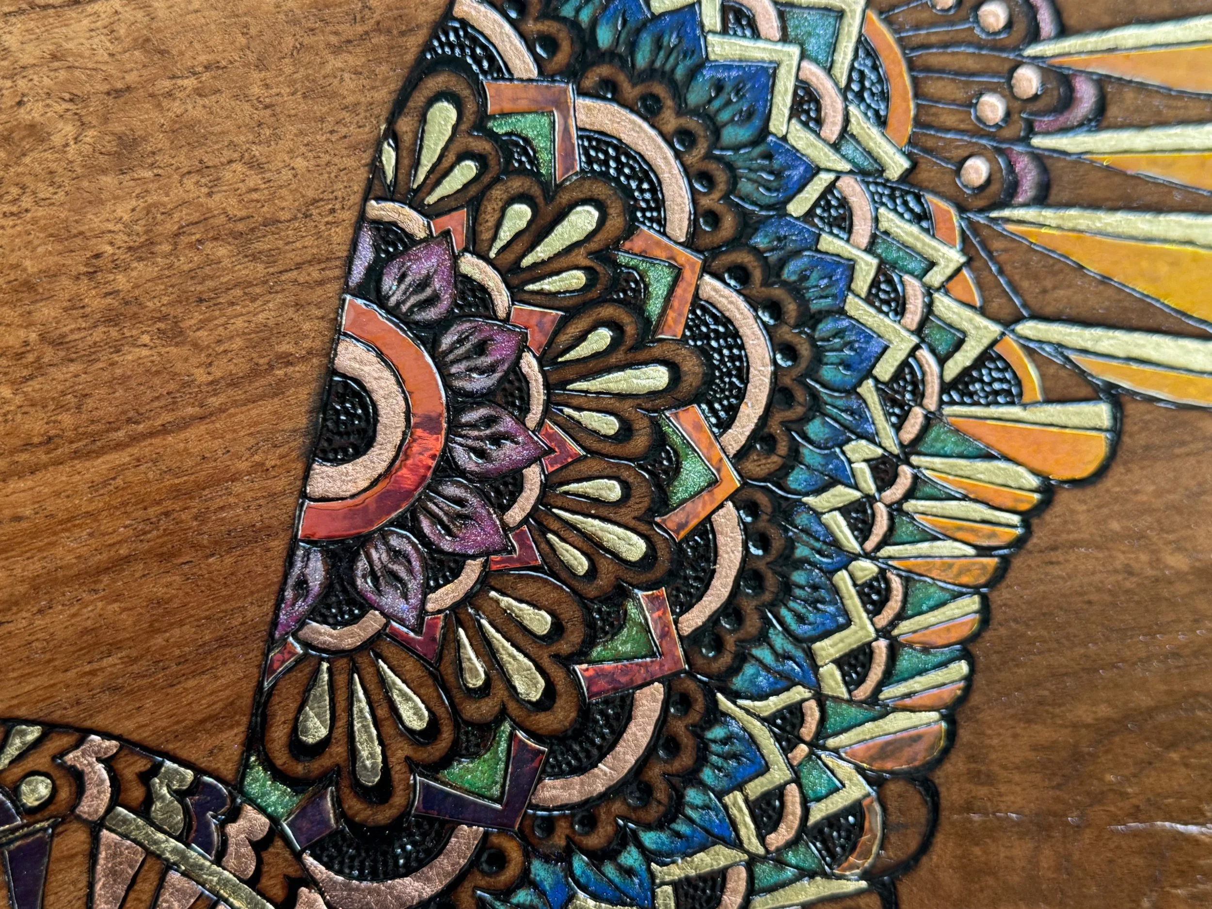 Emberwing wall art by Anne Shackelford, mesquite wood with resin, alcohol ink, and gilded highlights.